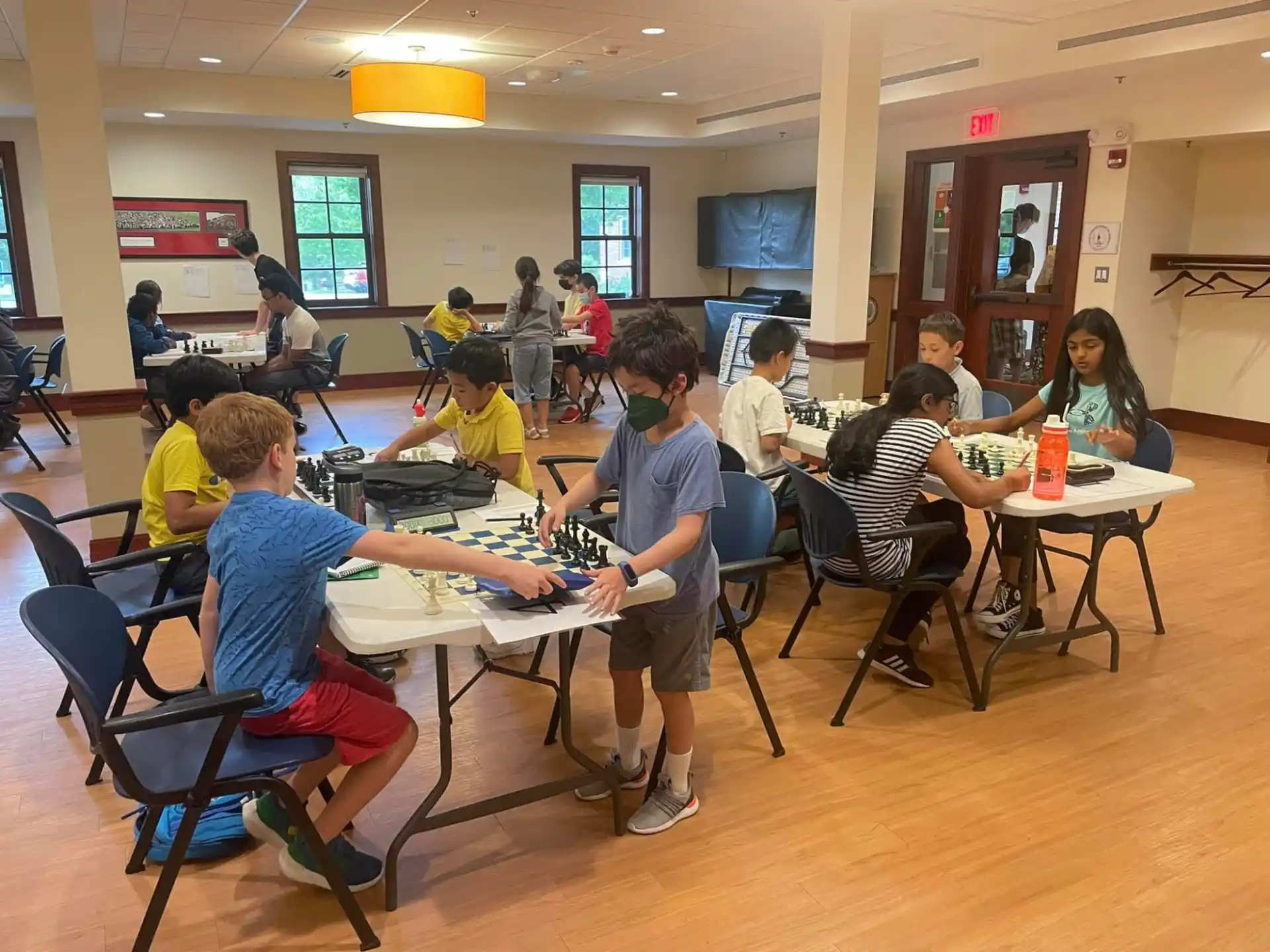 a group of people sitting at tables