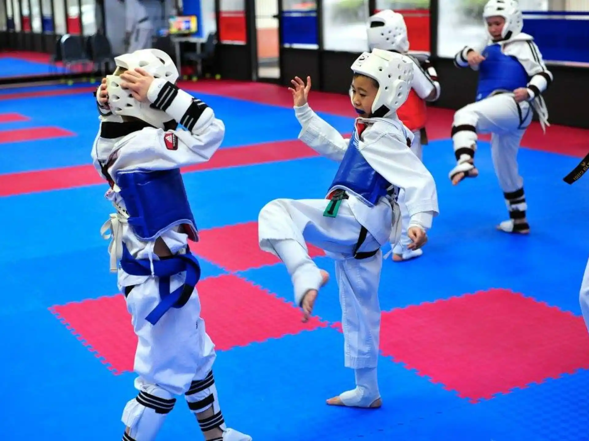 a group of people in white uniforms