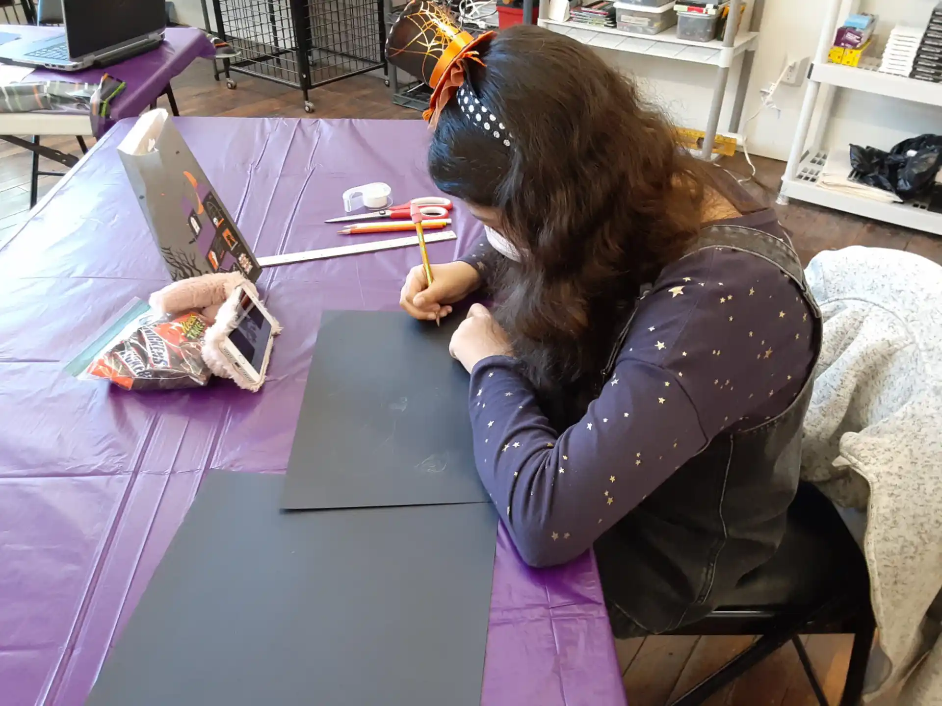 a person painting on a table