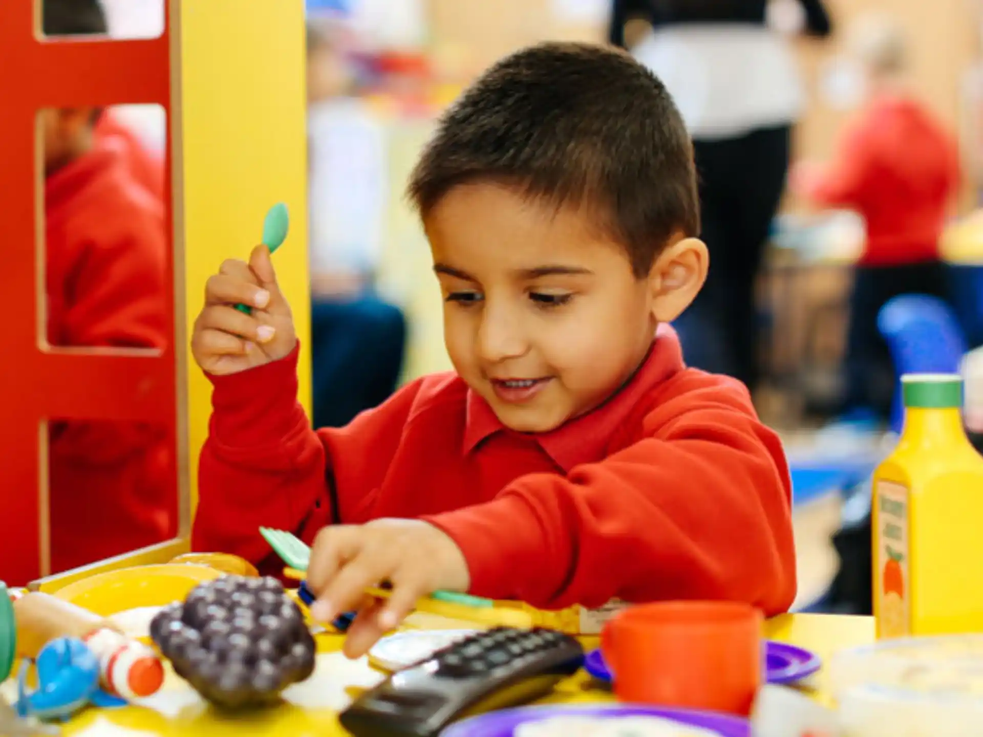 a boy eating a fruit