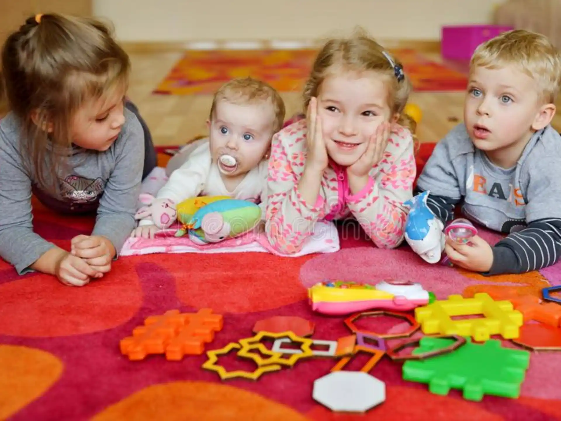a group of children playing with toys