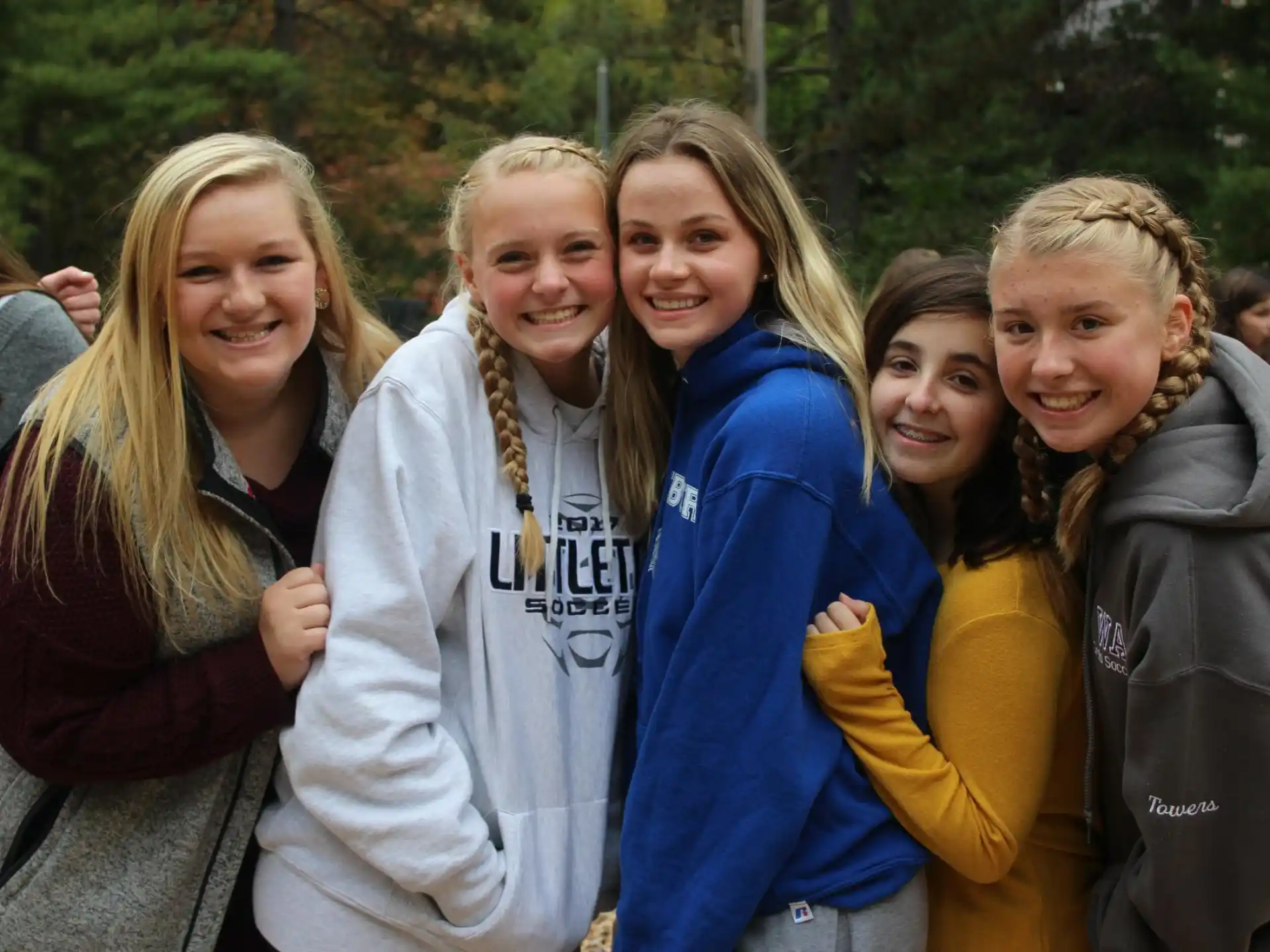 a group of women smiling