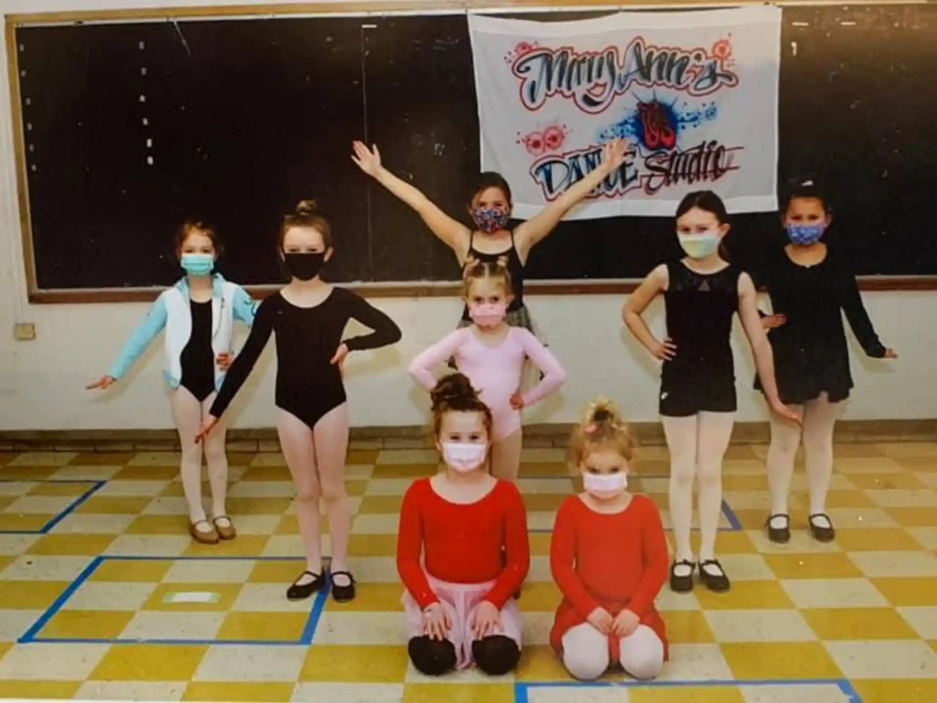 a group of children in a classroom