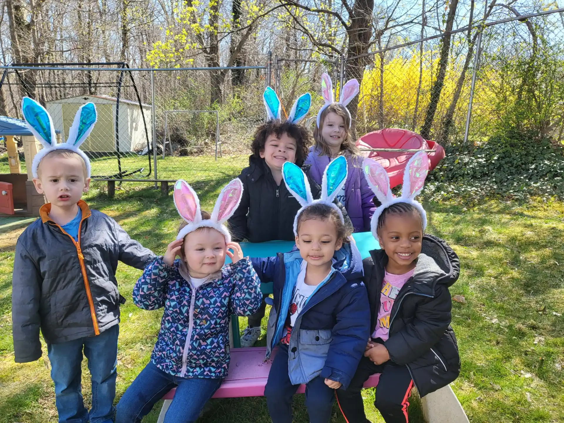 a group of children wearing bunny ears