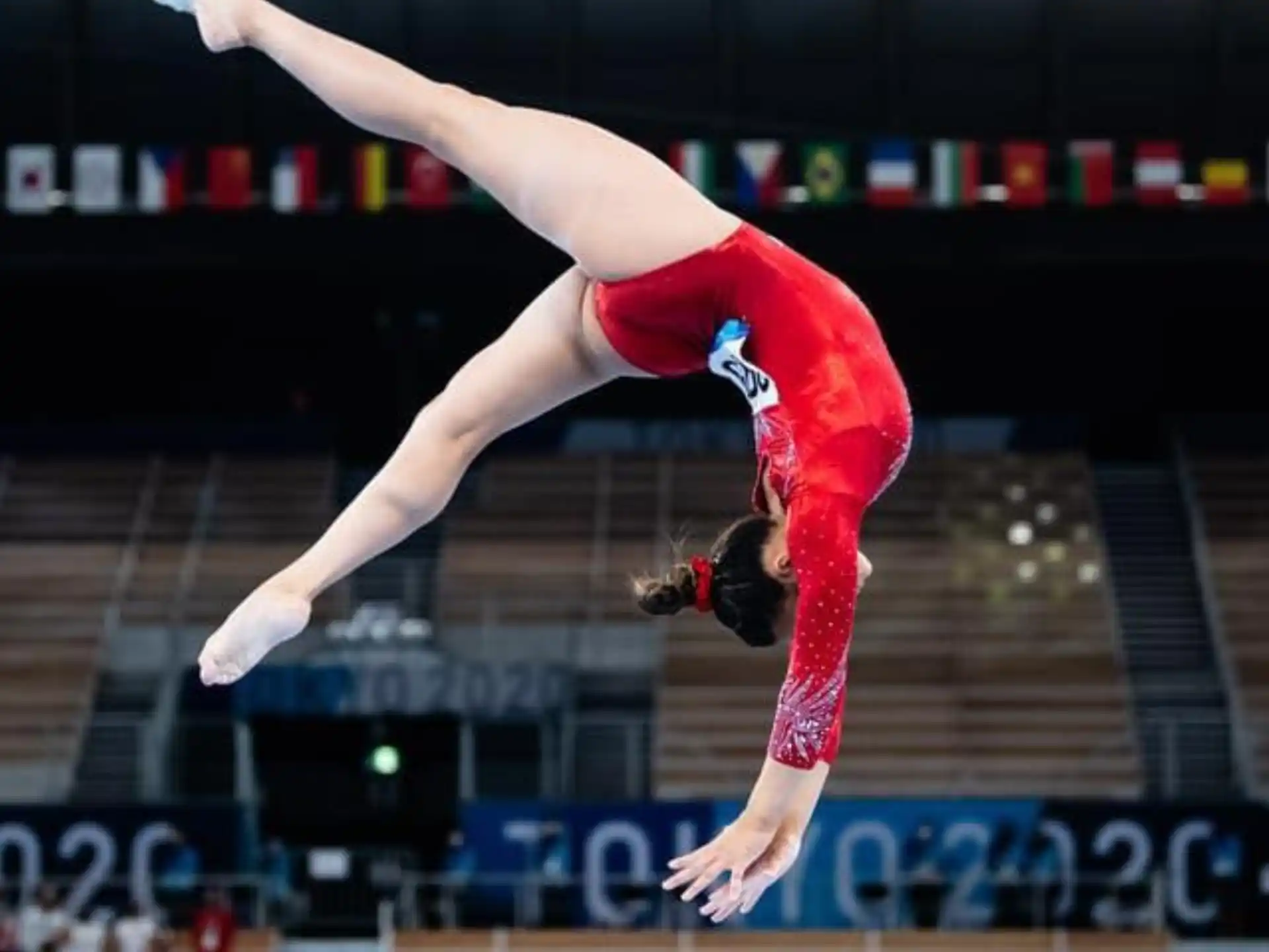 a woman doing a high jump