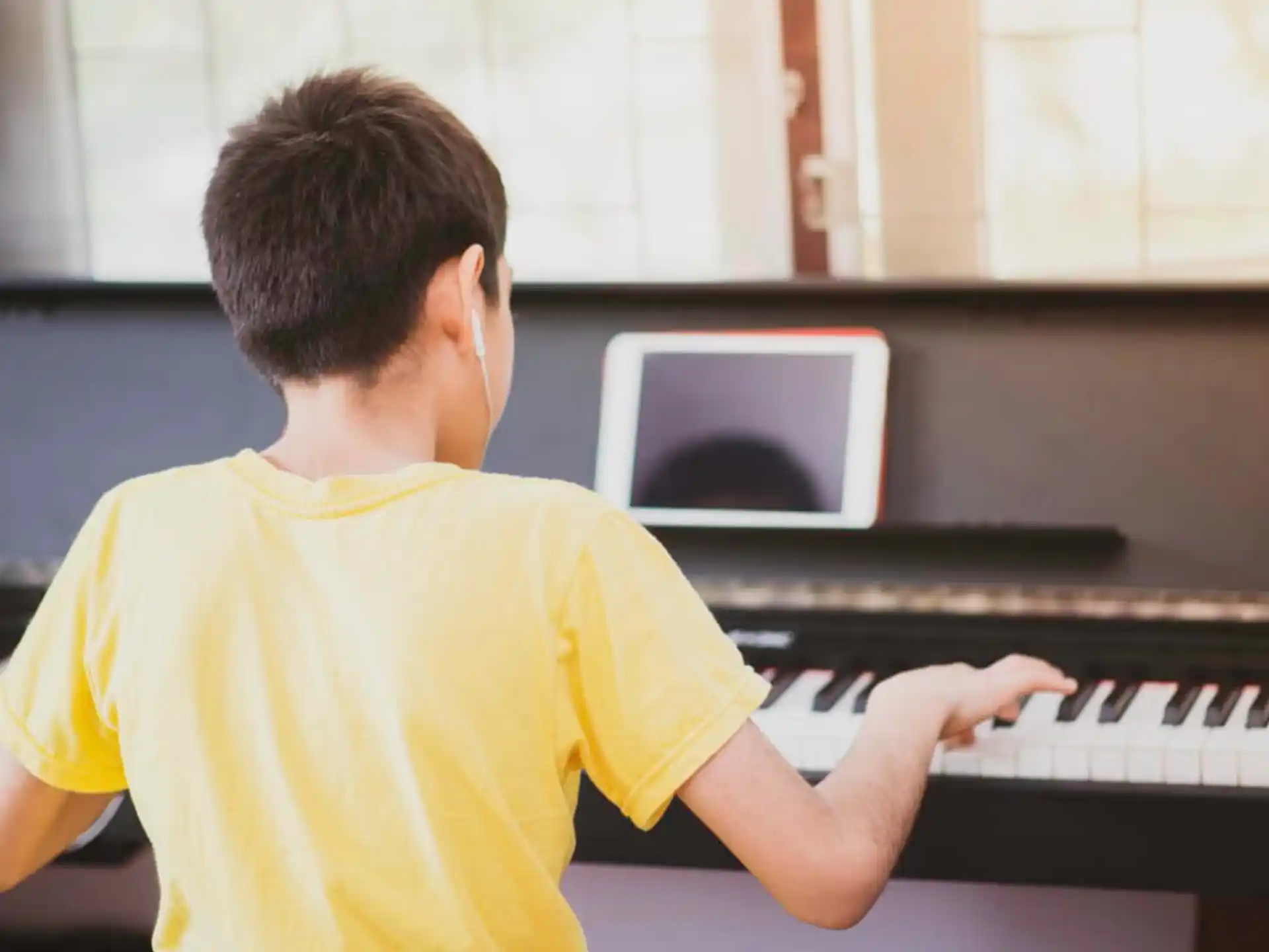 a man playing a piano