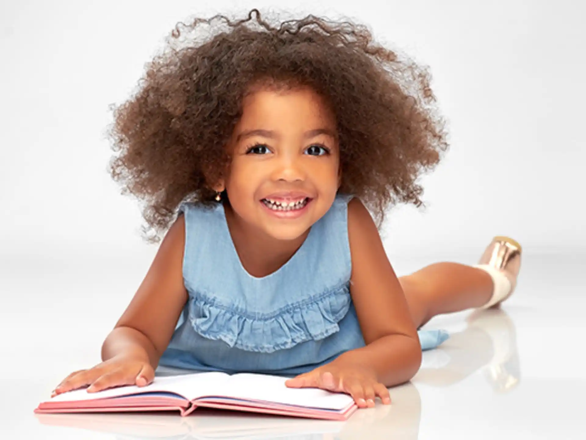 a child sitting at a desk
