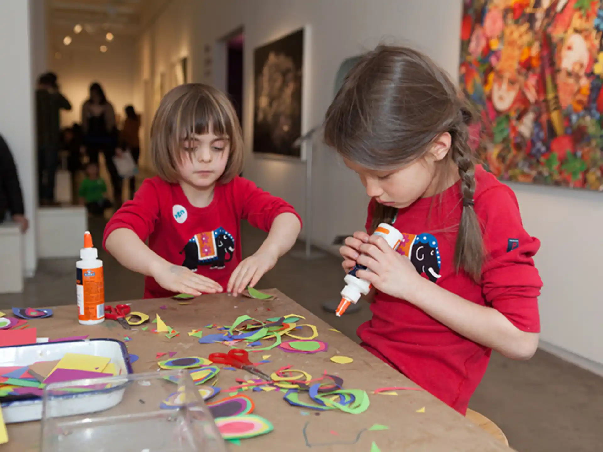 a couple of girls playing with toys
