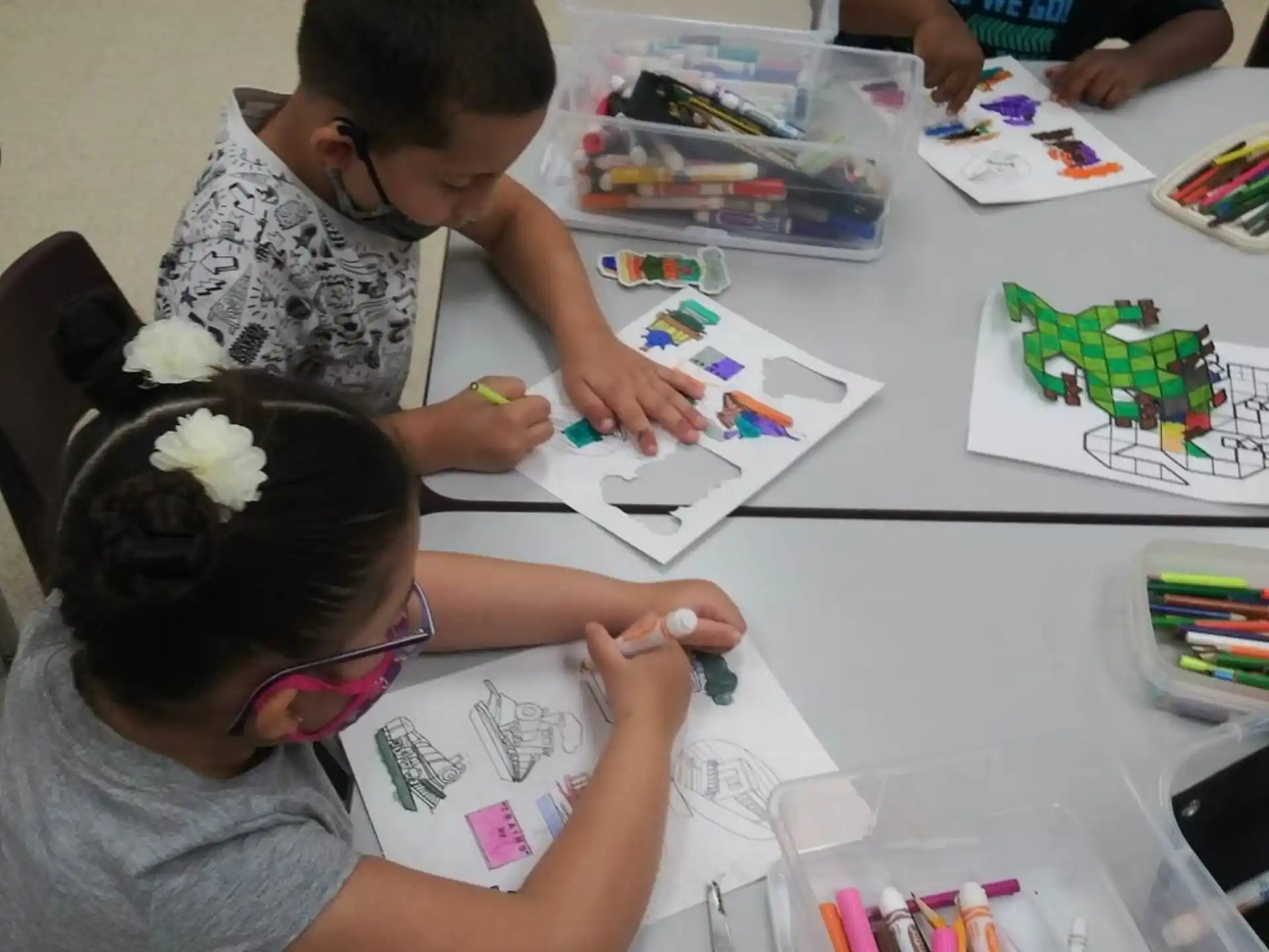 a group of people painting
