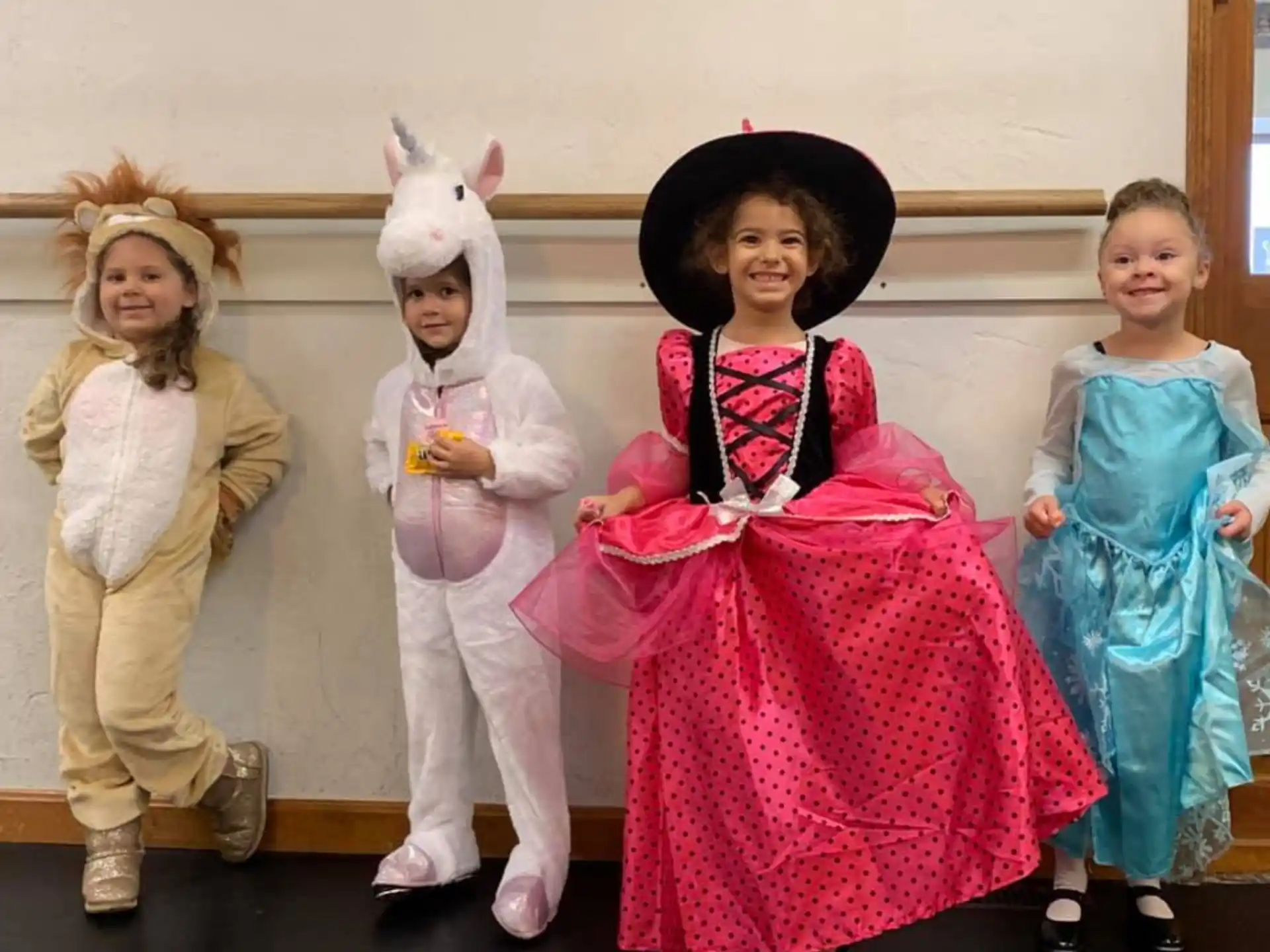 a group of children wearing clothing