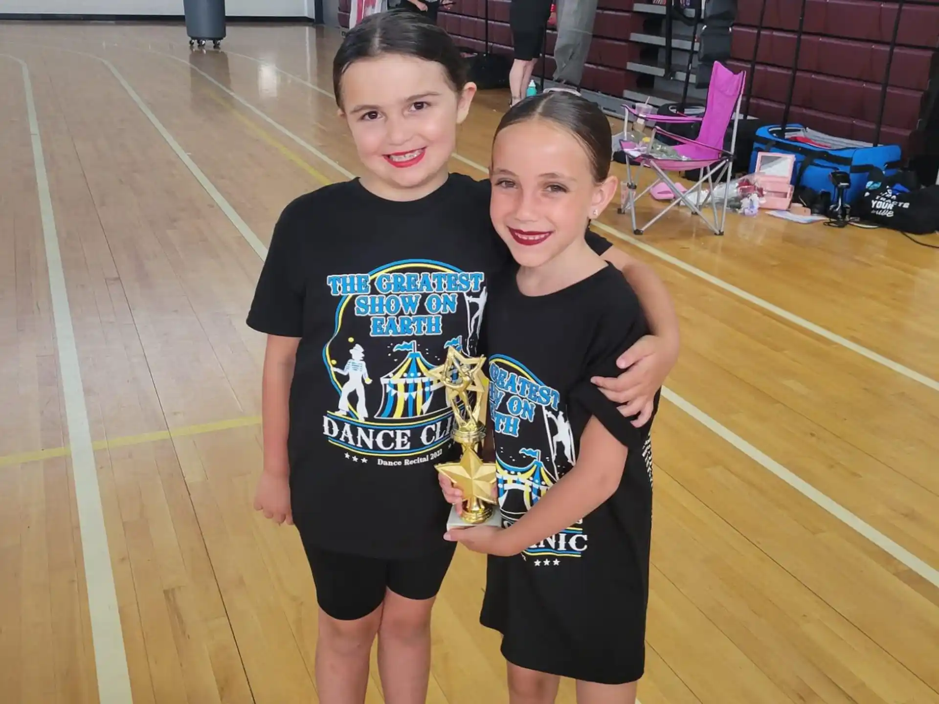 two girls in black shirts