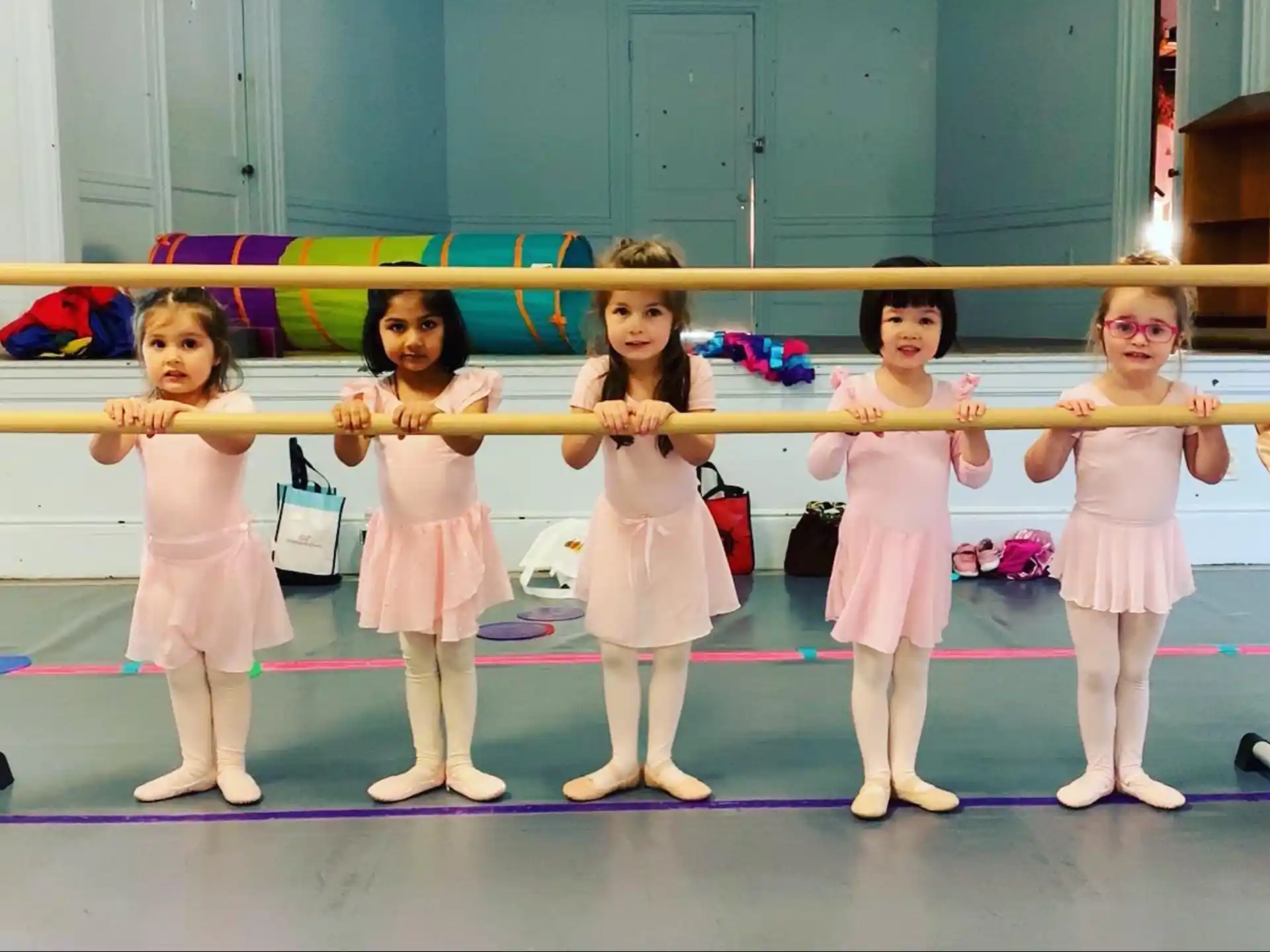 a group of girls in a gym