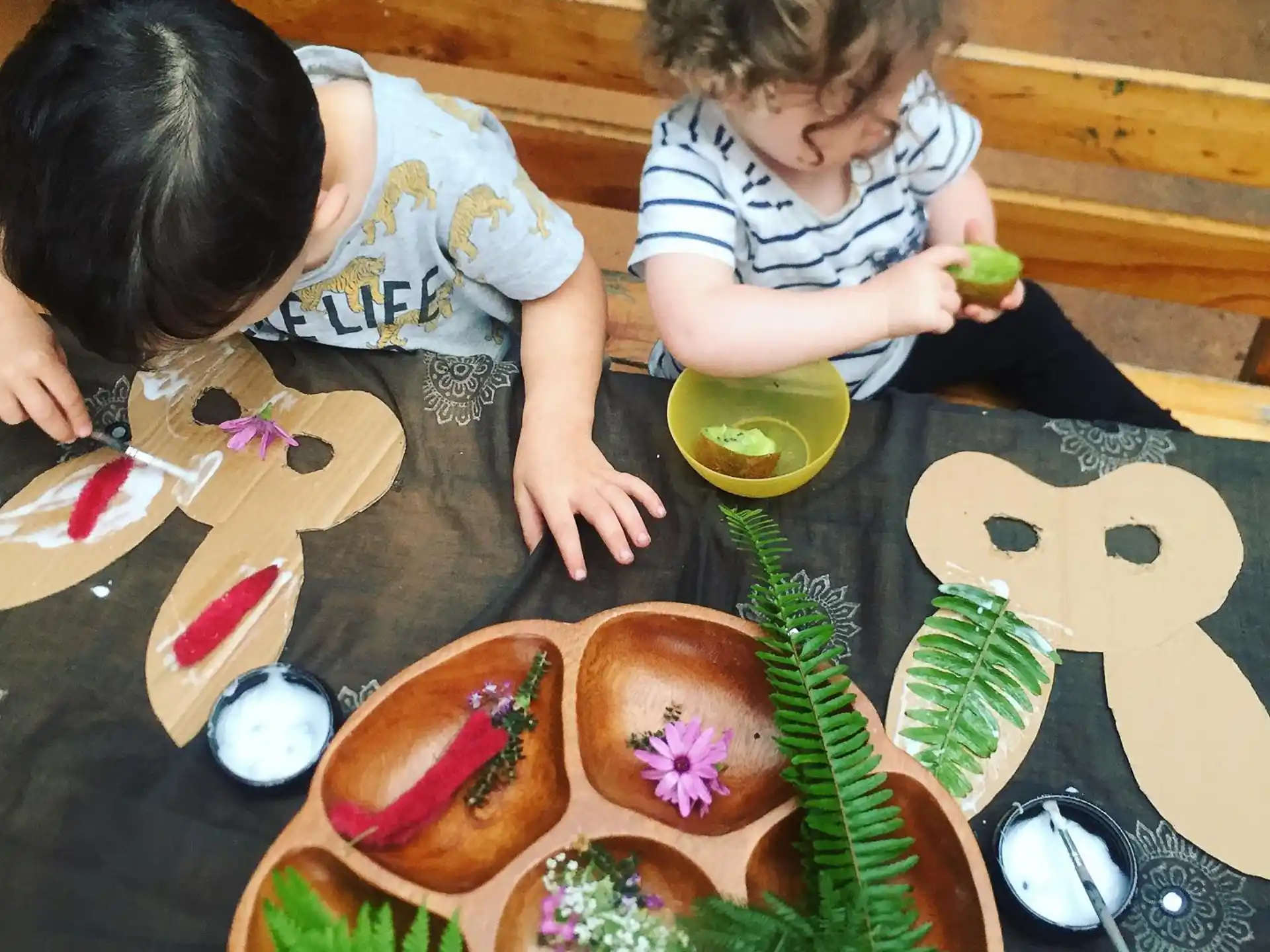 a group of kids eating food