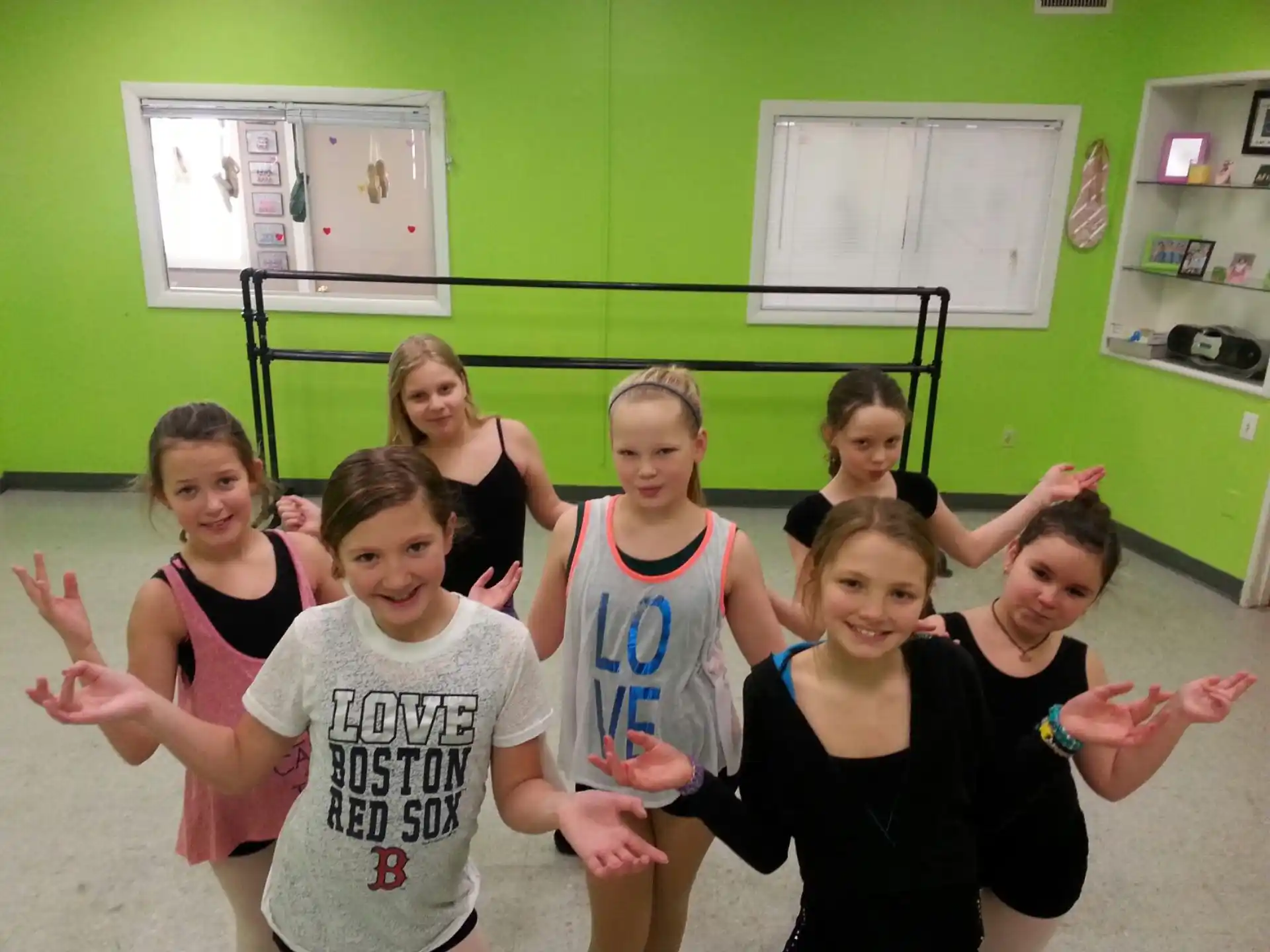 a group of girls posing for a photo