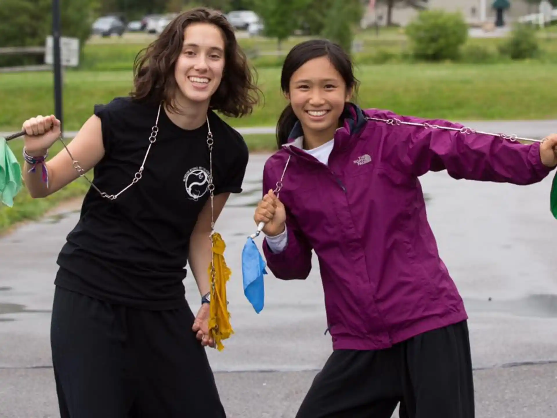 a couple of women holding bags