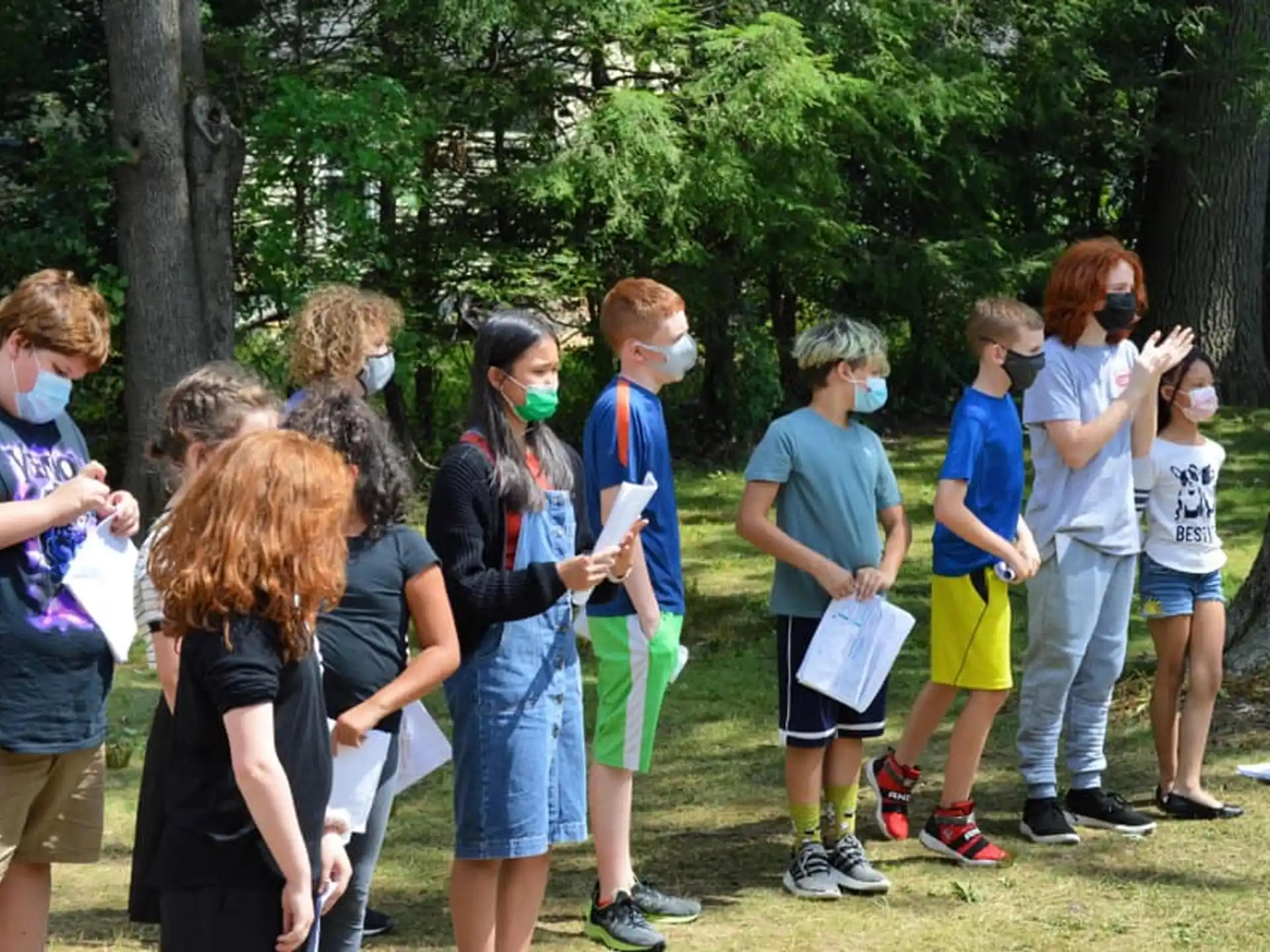 a group of people standing outside