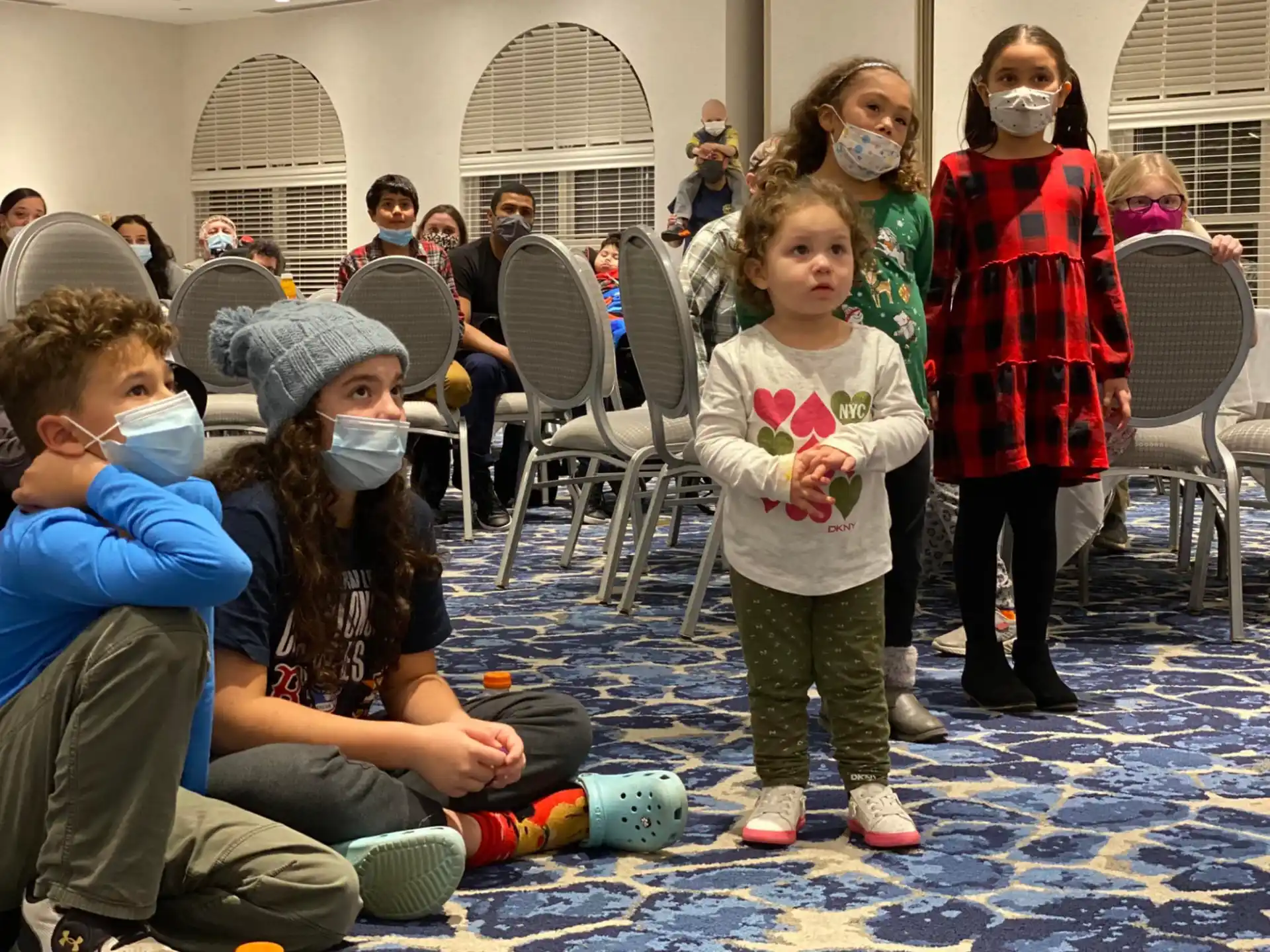a group of children wearing face masks