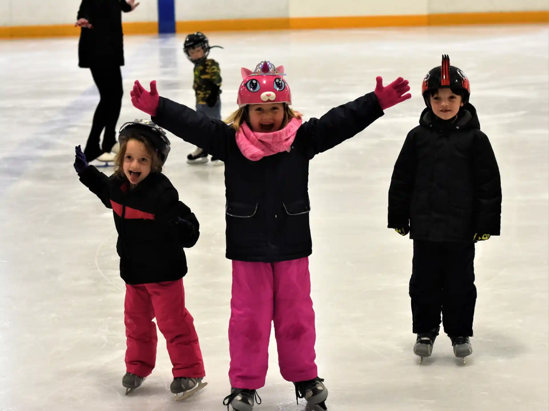 a group of people on an ice rink