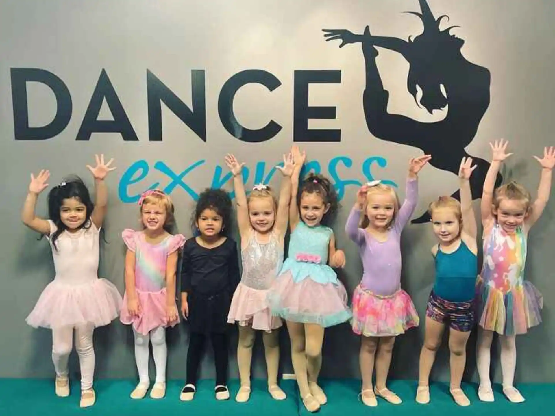 a group of girls posing for a photo