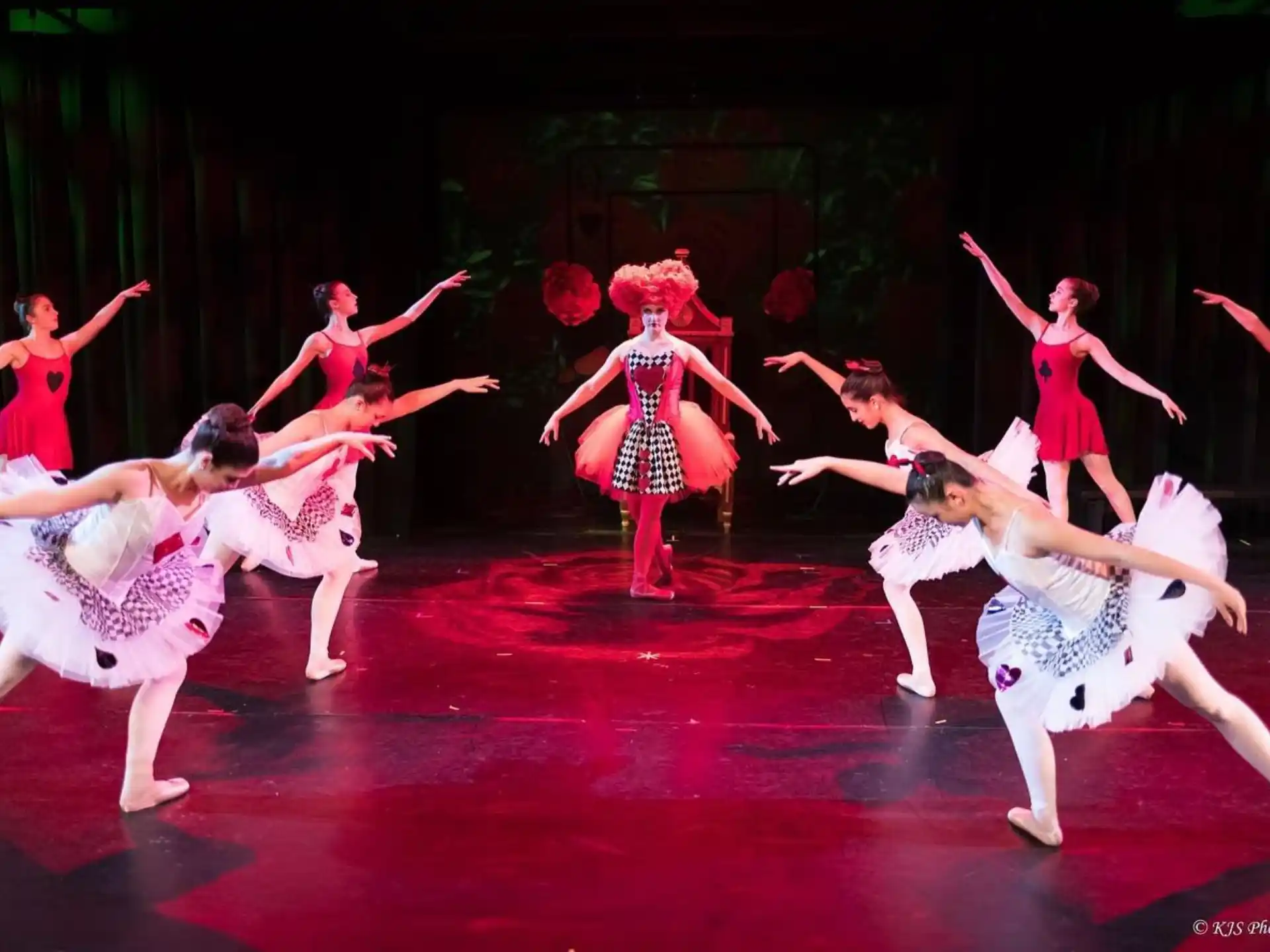 a group of women dancing on a stage