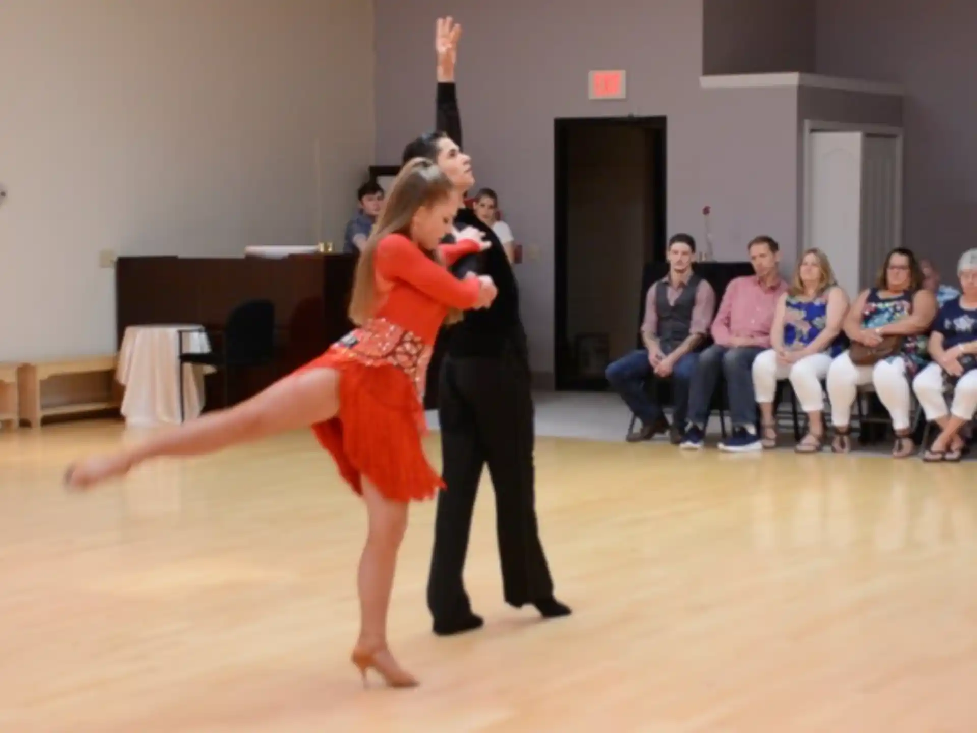 a man and woman dancing