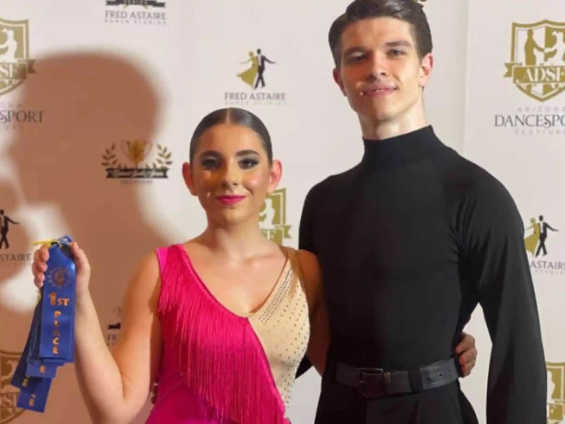 a man and woman posing for a picture