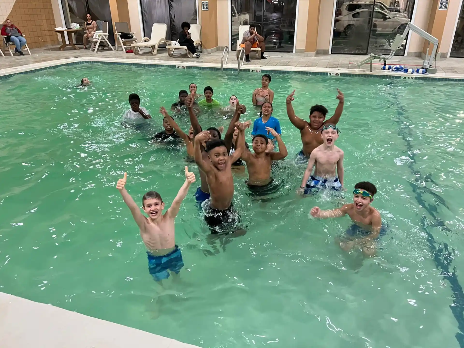 a group of people in a pool