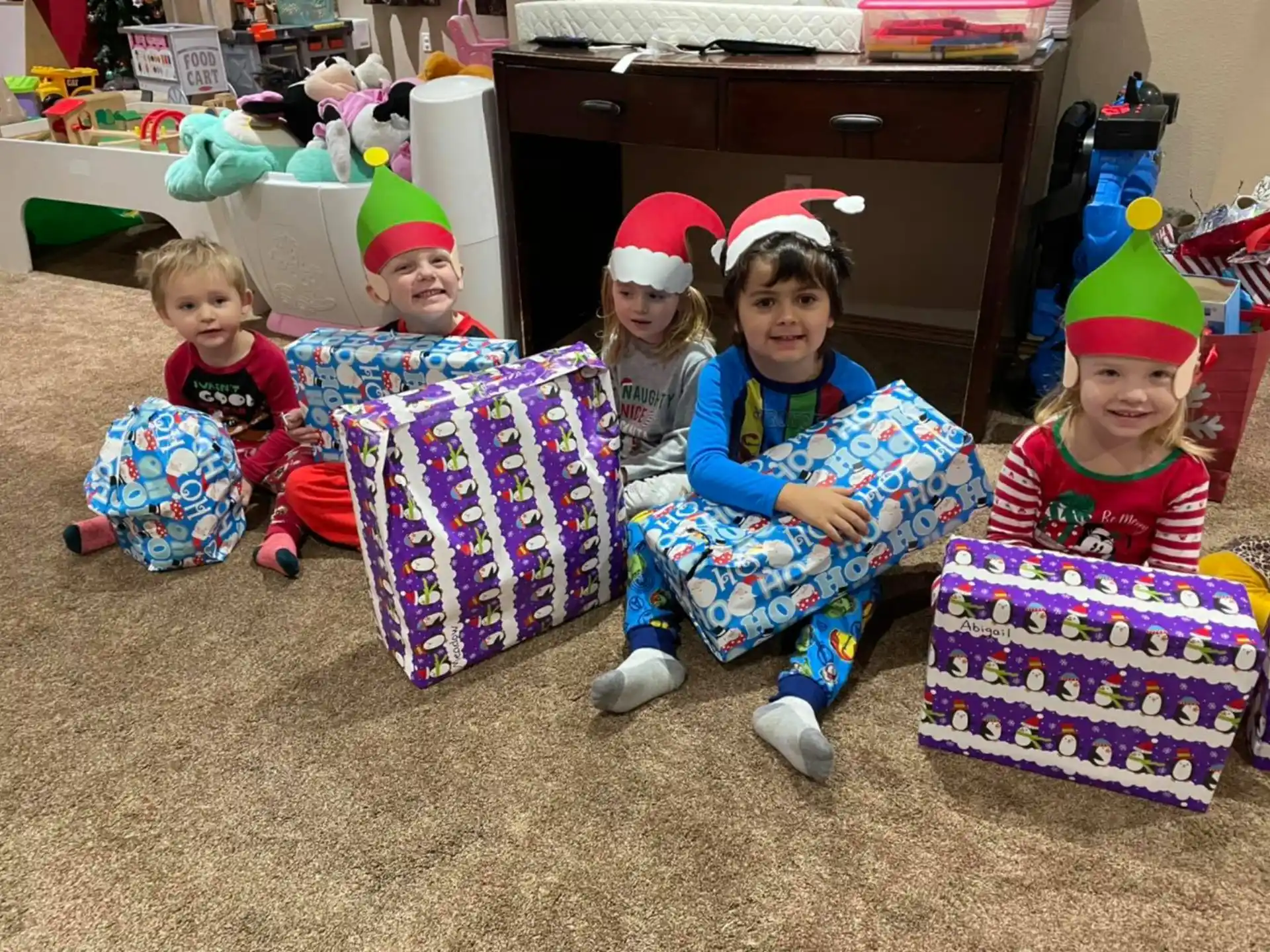 a group of children wearing party hats