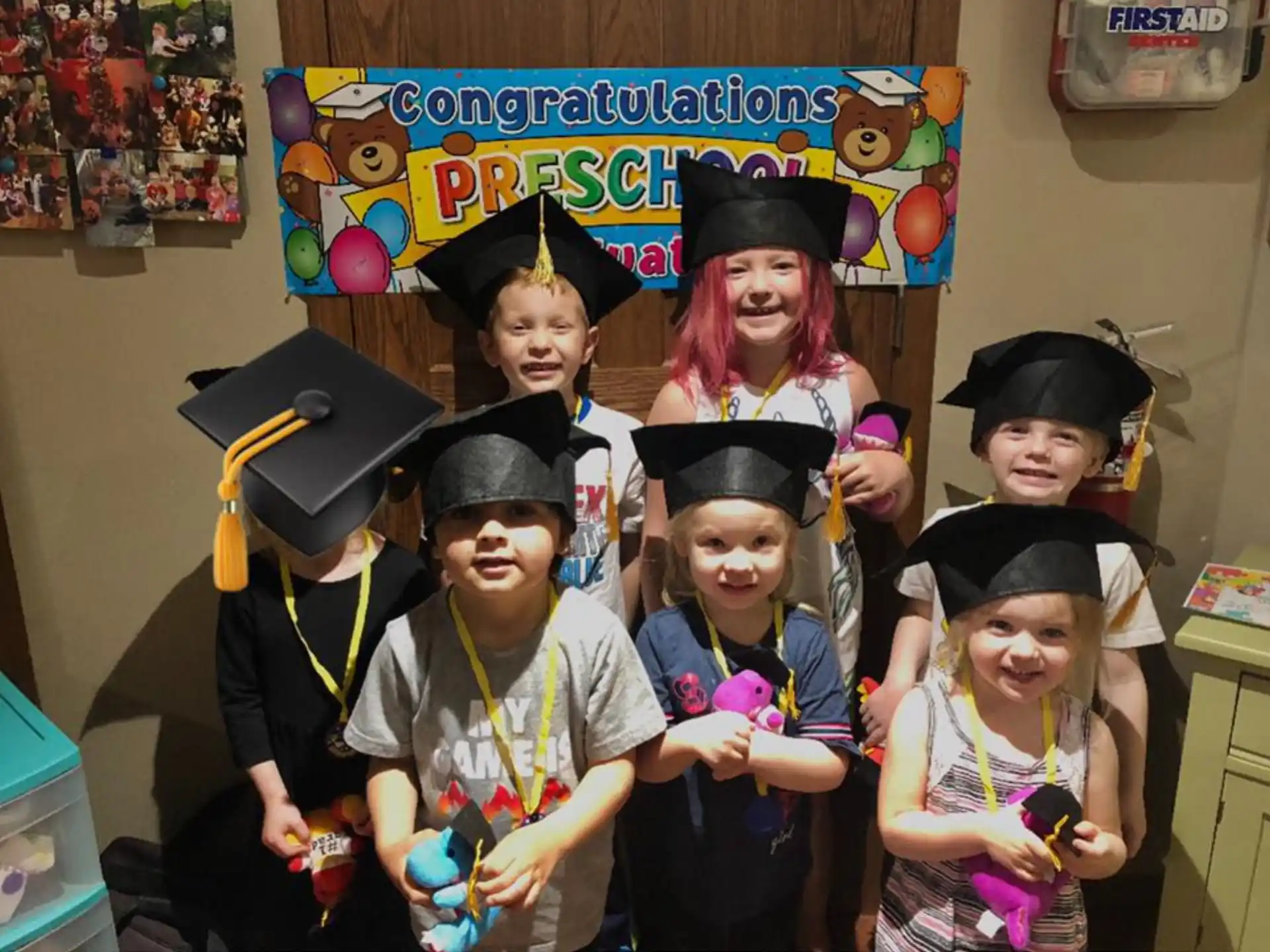 a group of kids wearing clothing
