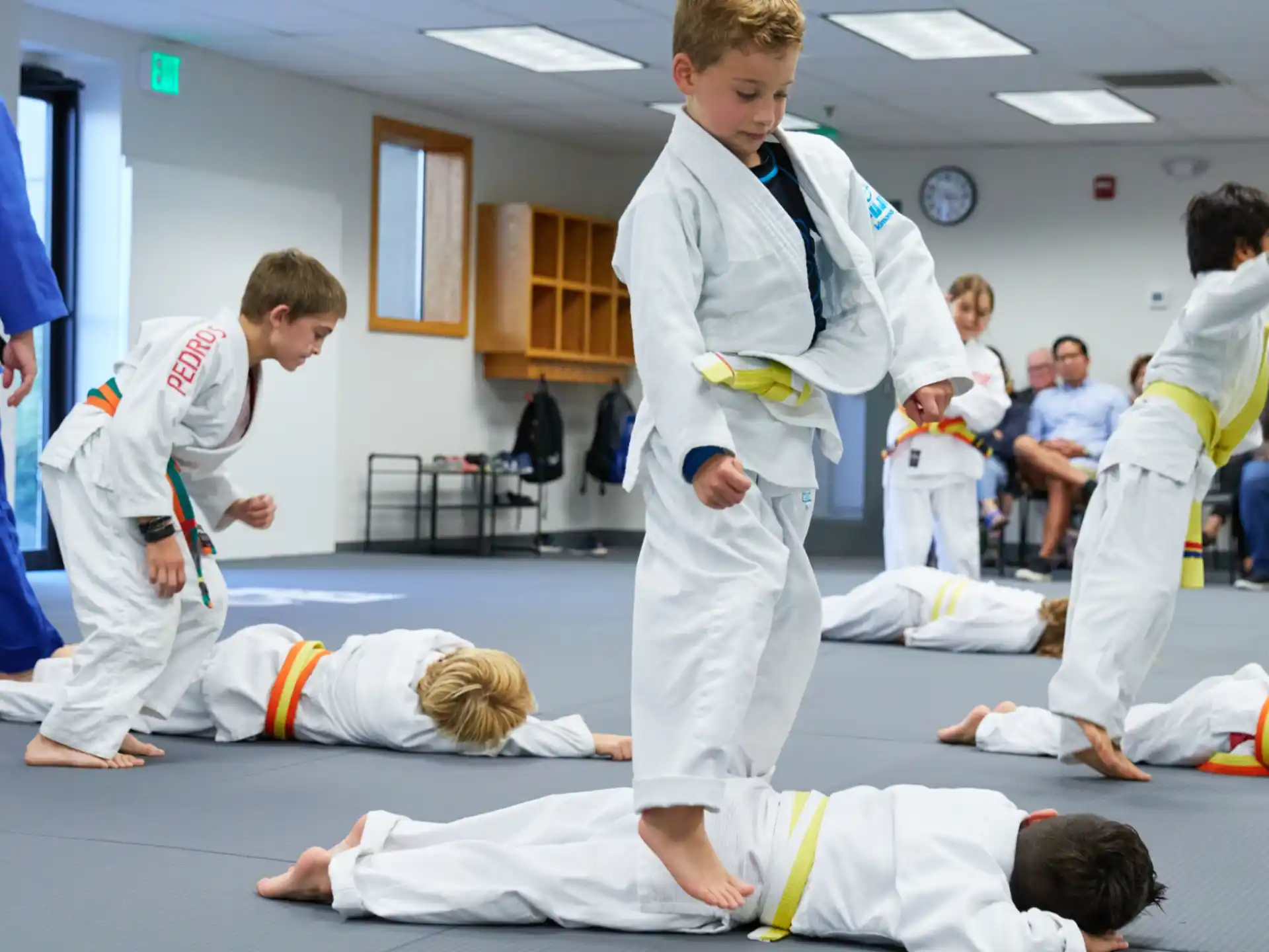 a group of people in karate uniforms