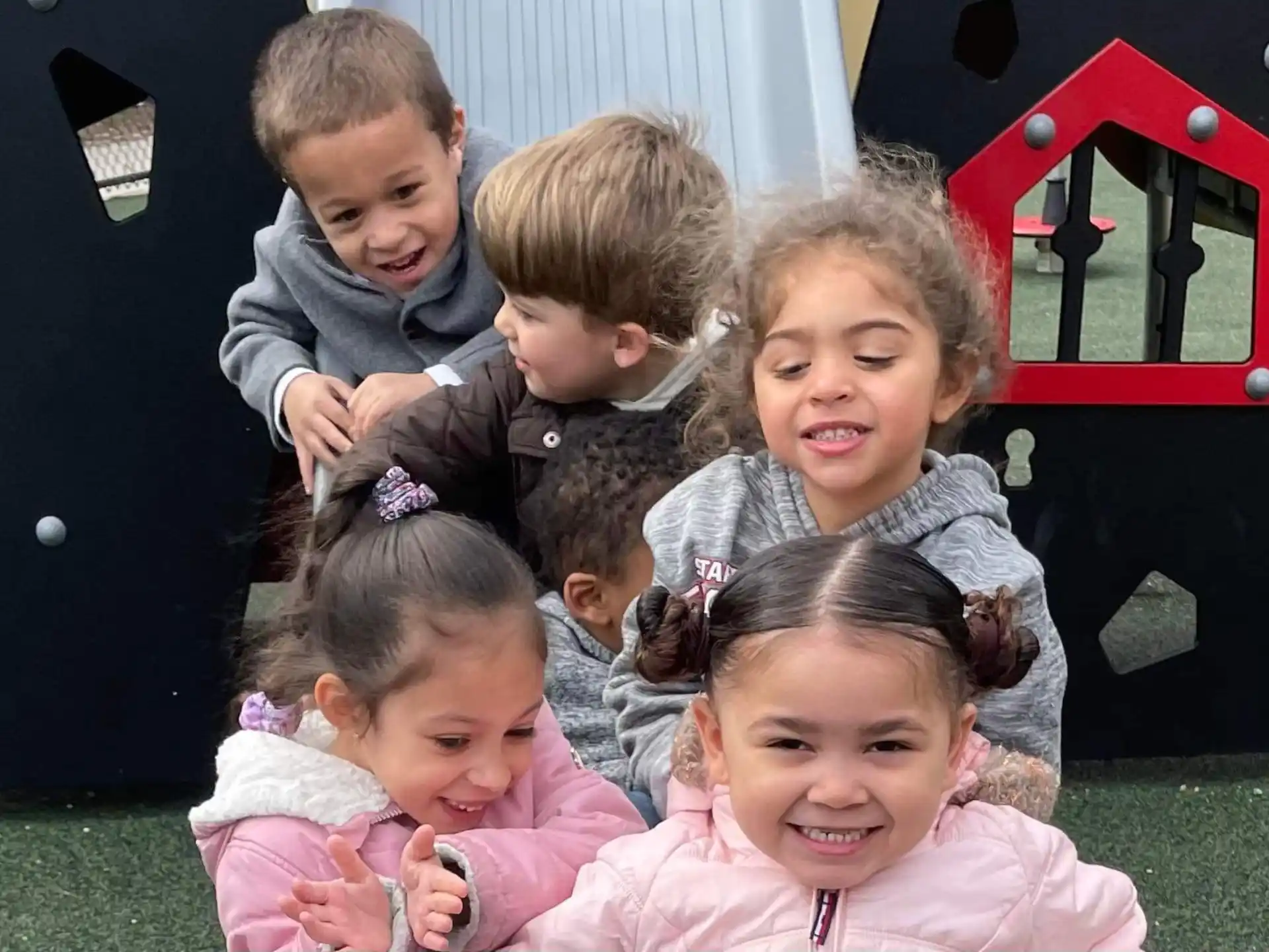 a group of children smiling