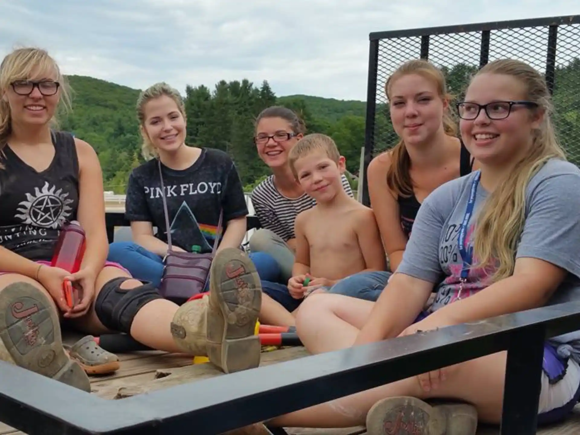 a group of people sitting on a boat