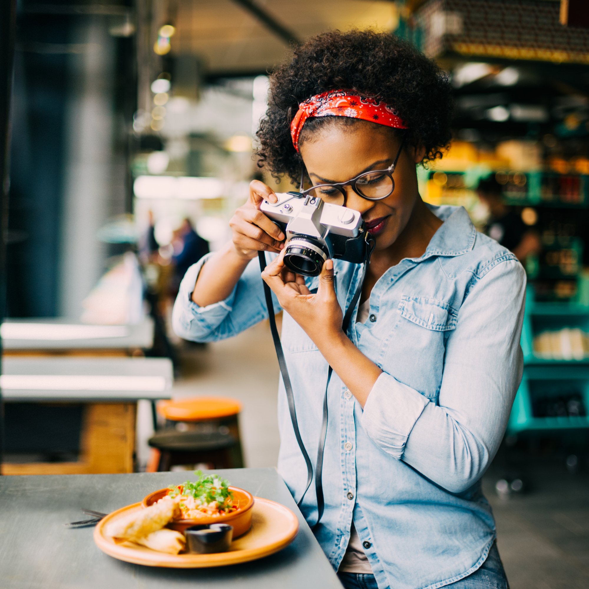 a person holding a camera