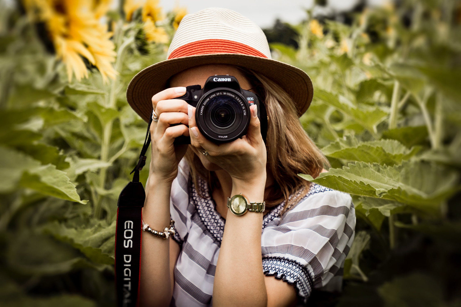 a person holding a camera