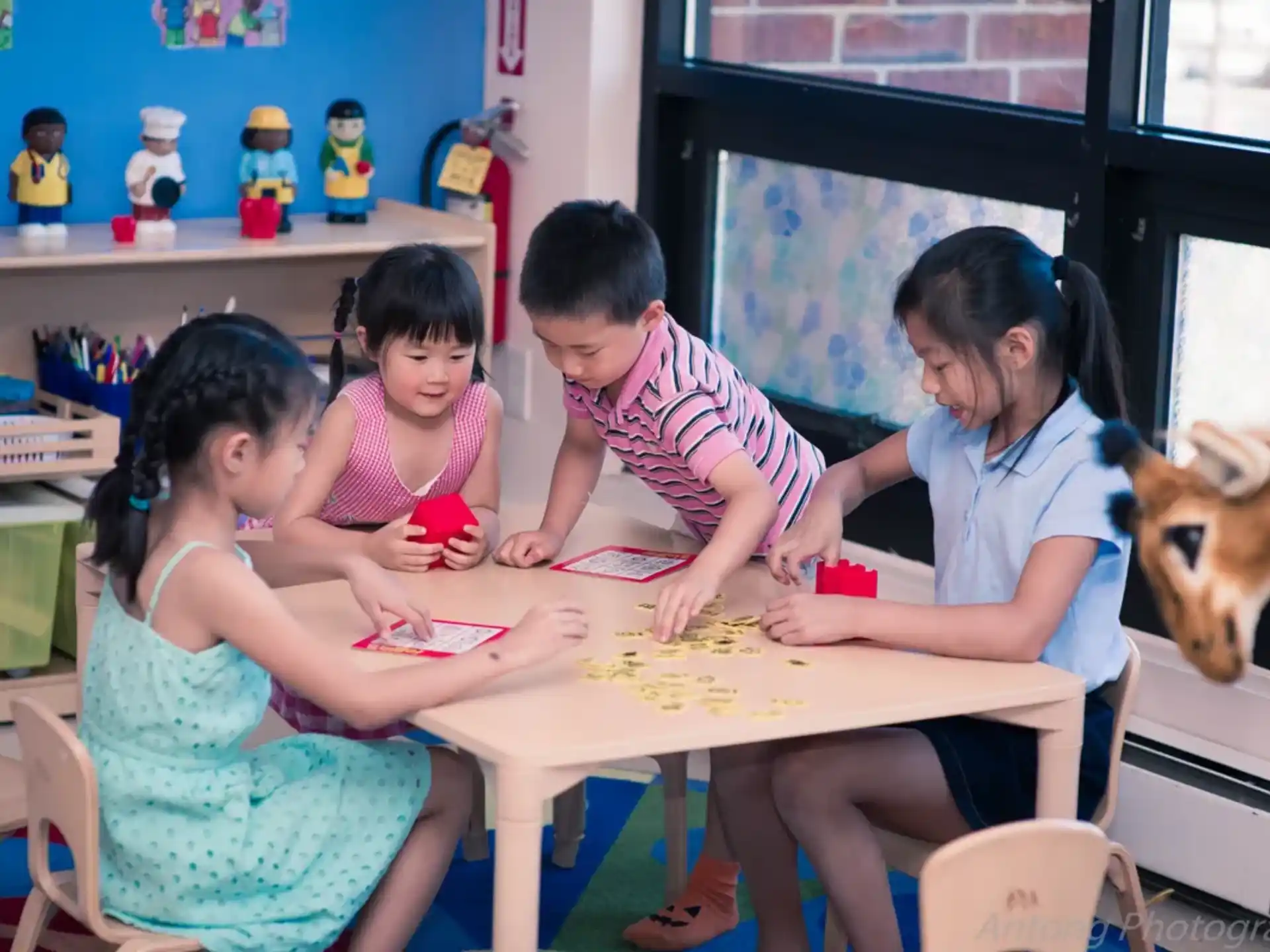 a group of people sitting around a table