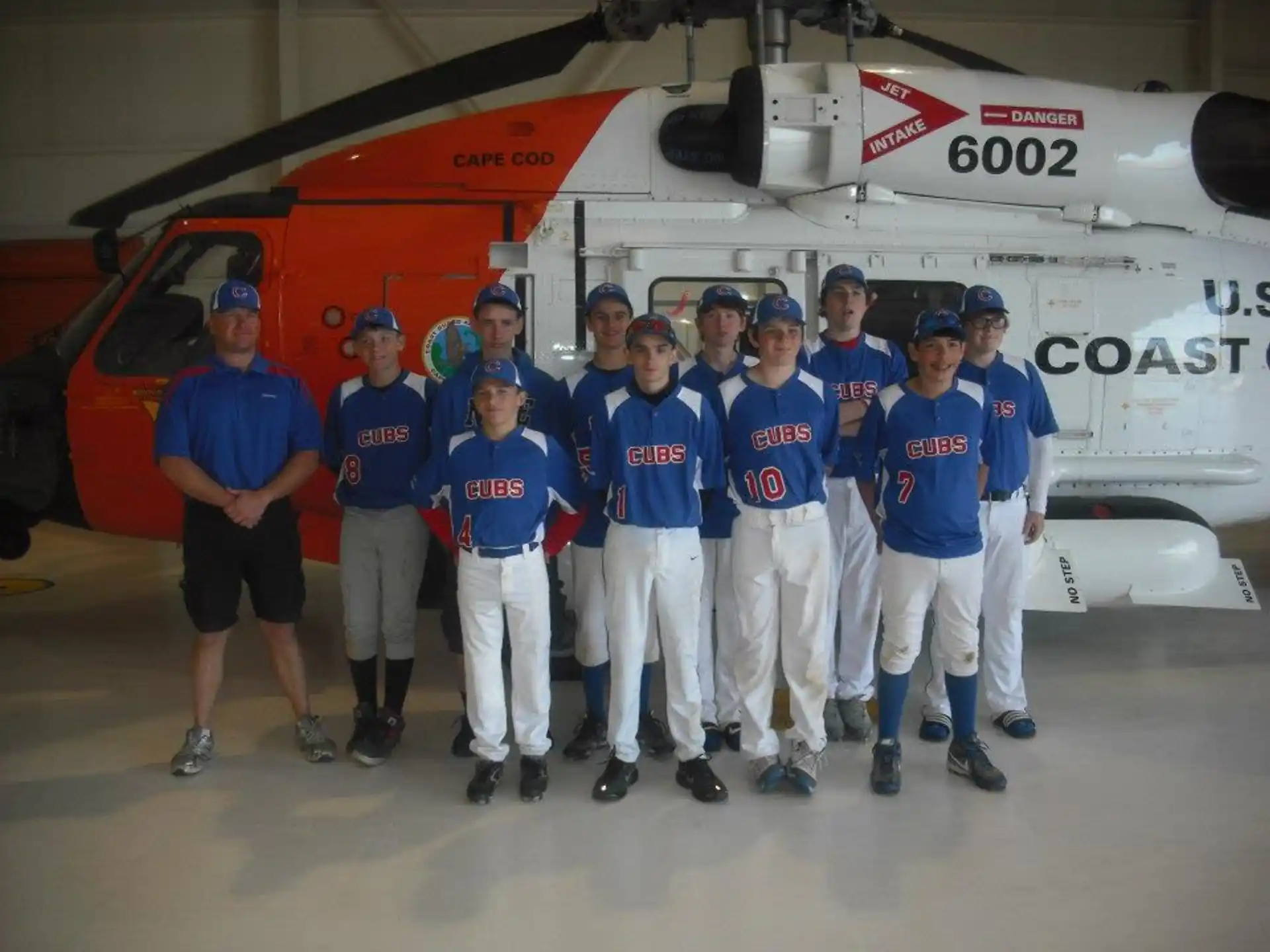 a group of people in blue uniforms
