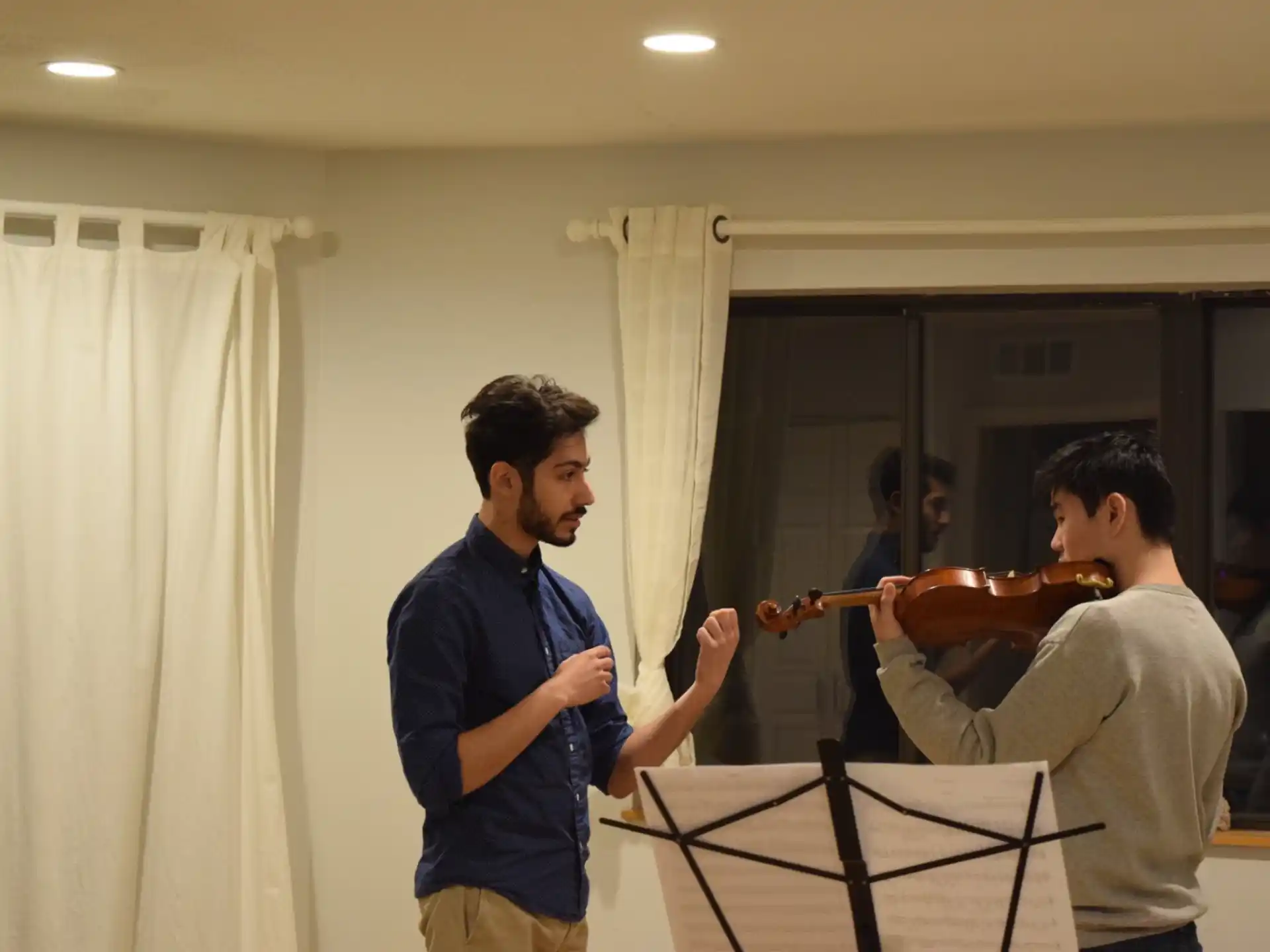 a man playing a violin