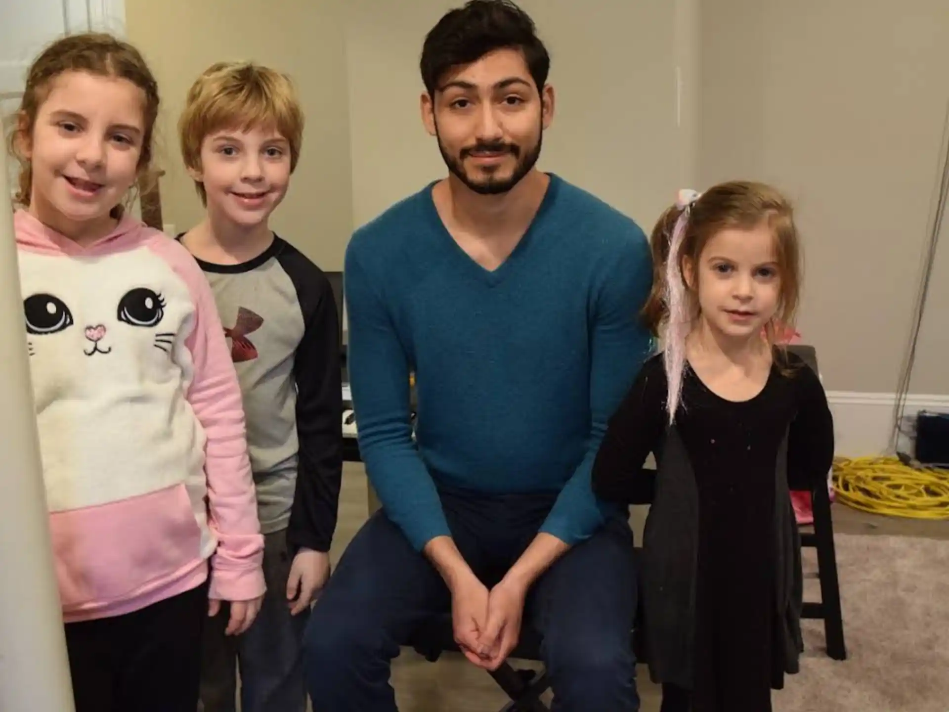 a person and two girls