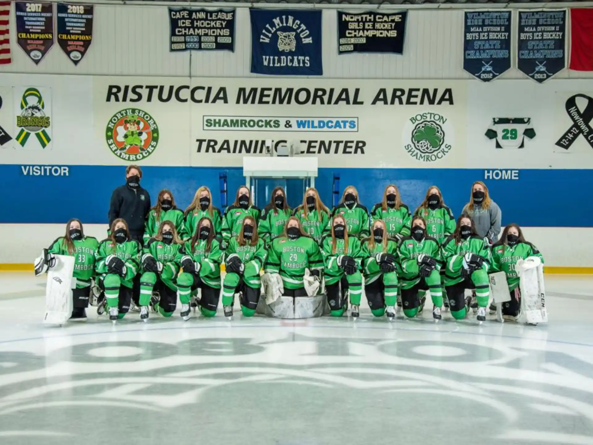 a group of people wearing hockey uniforms