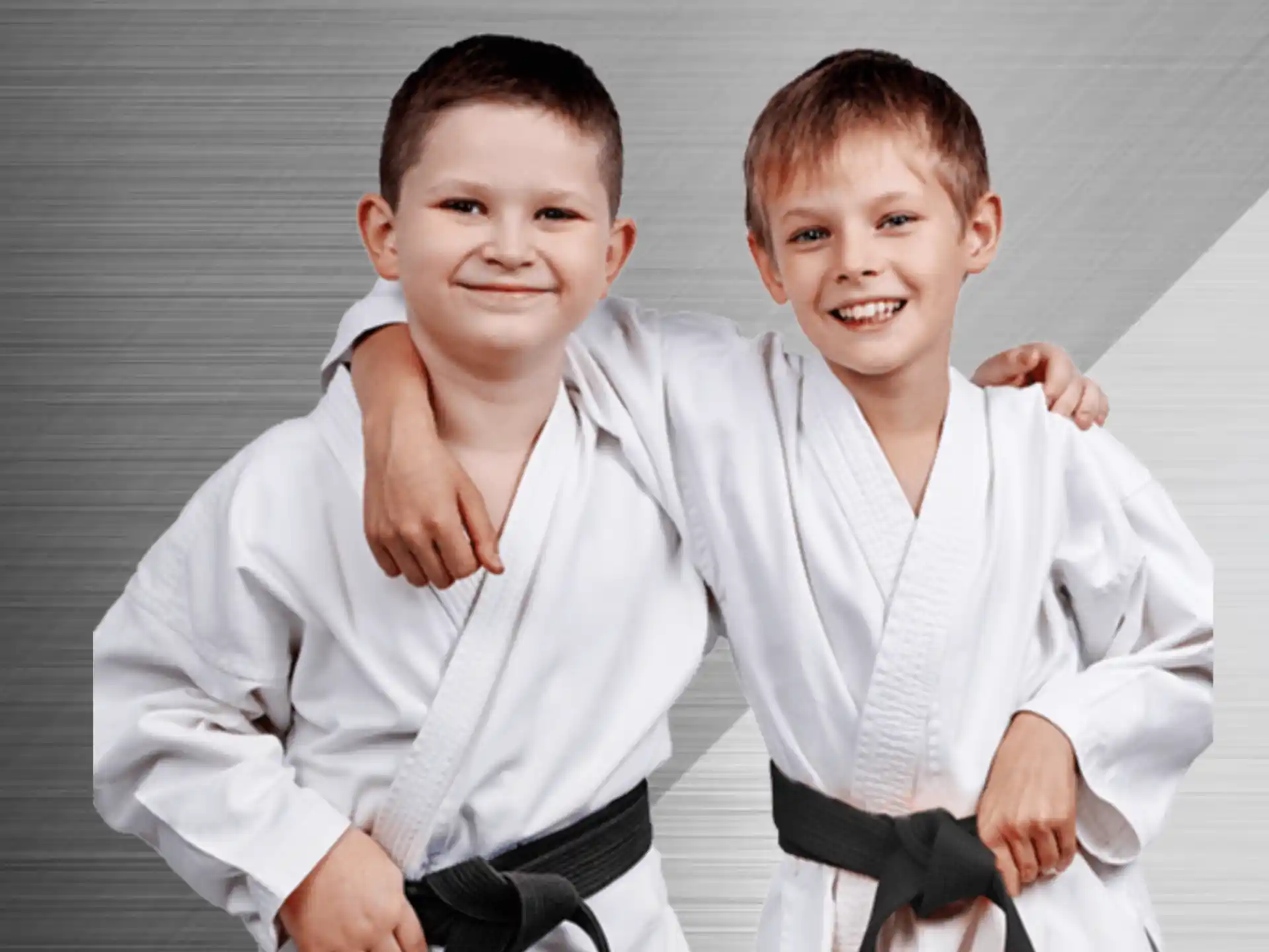 a couple of boys posing for the camera
