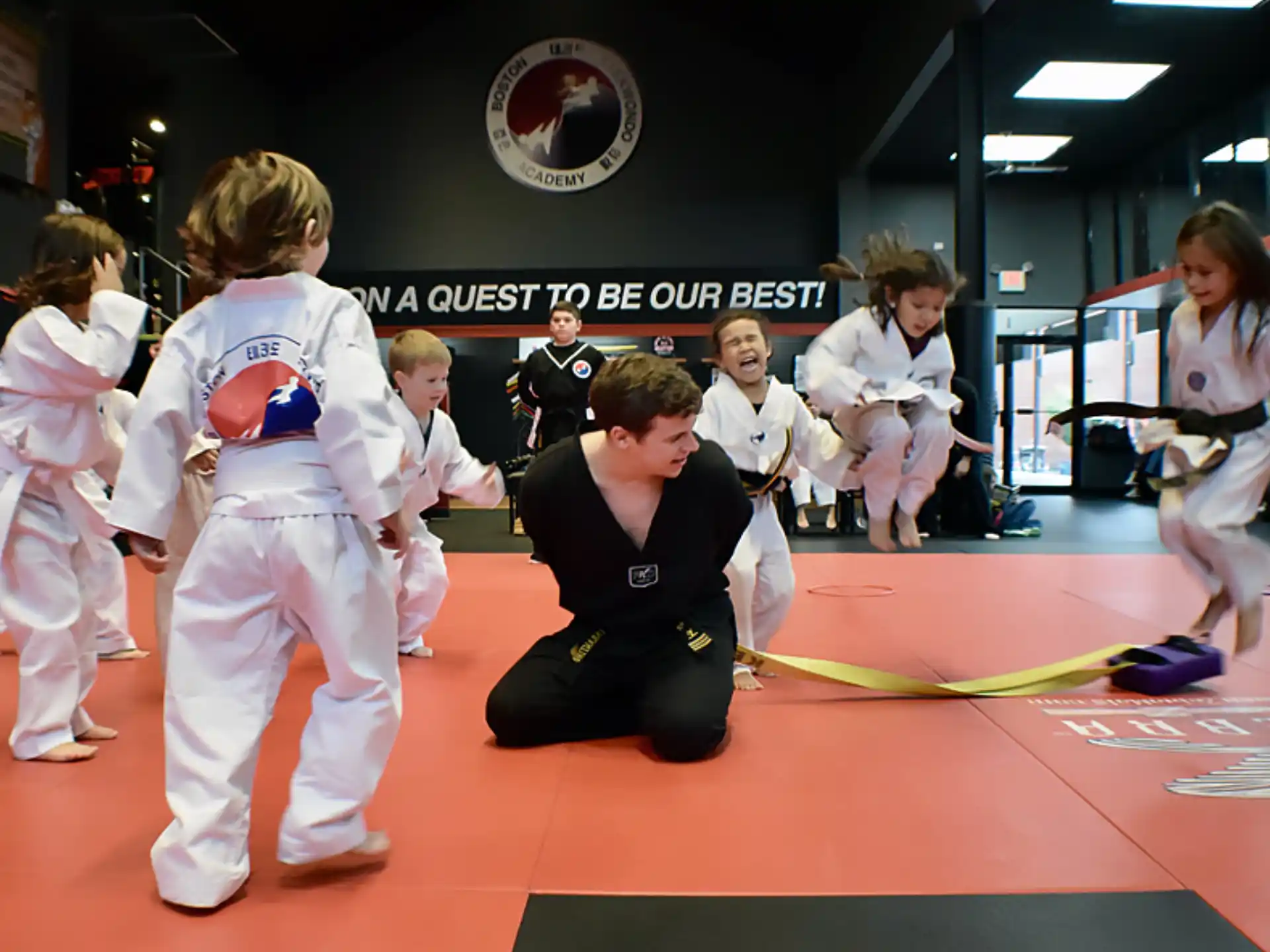 a group of people in karate uniforms