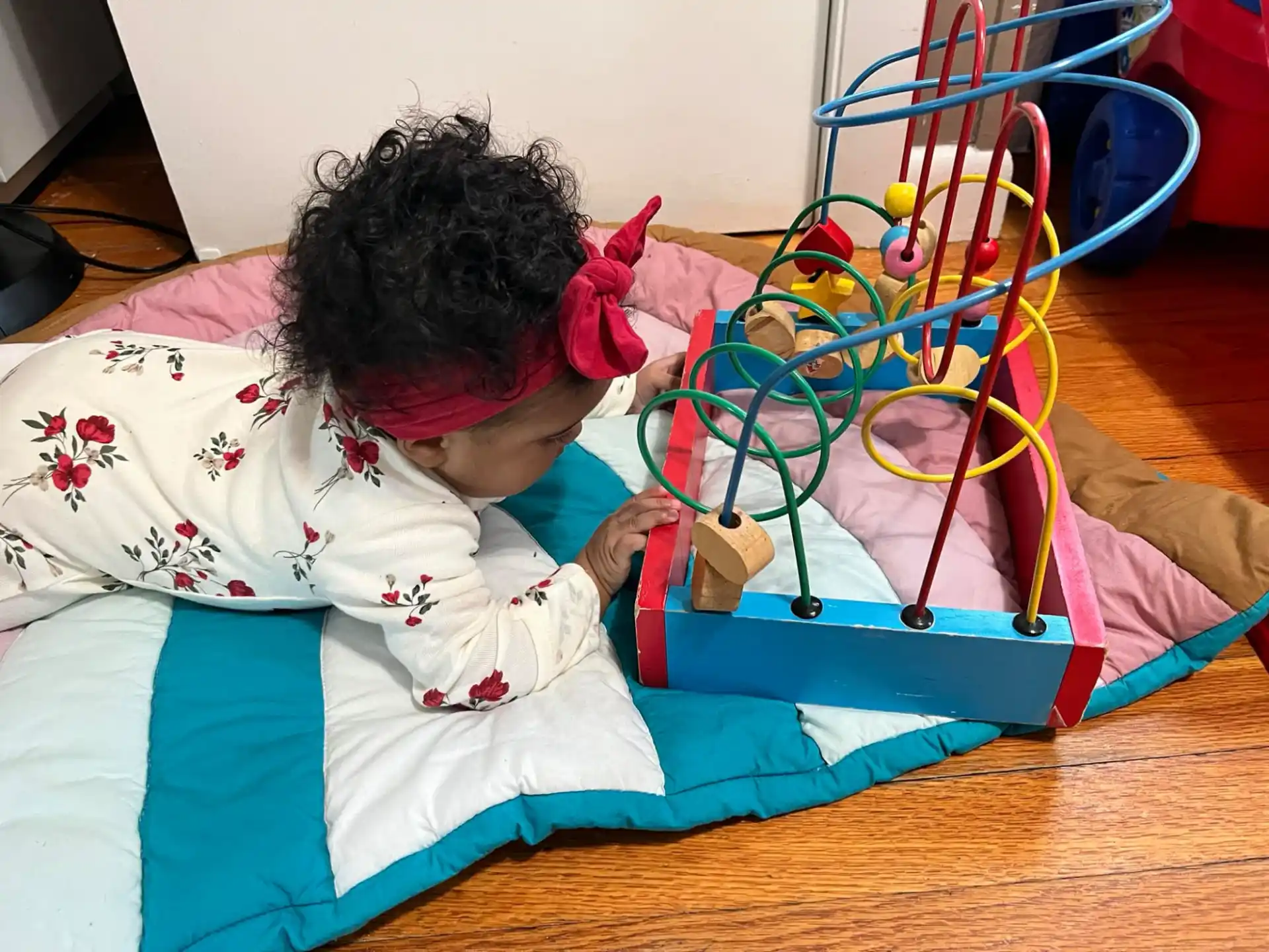 a baby playing with a toy