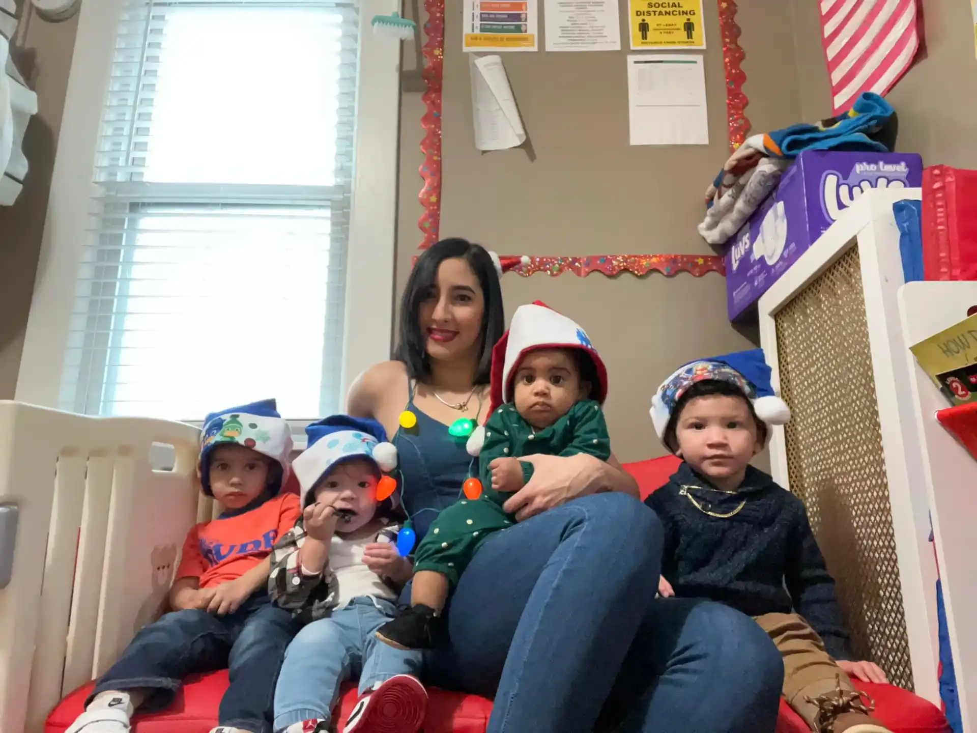 a group of children sitting in chairs