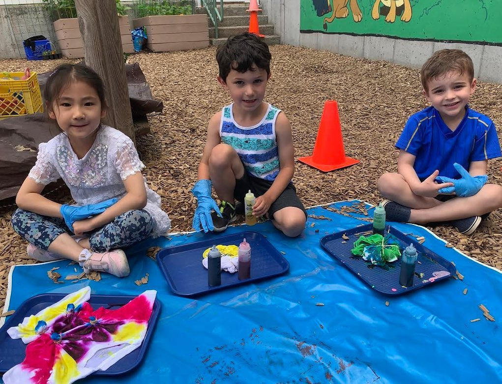 a group of children playing with toys