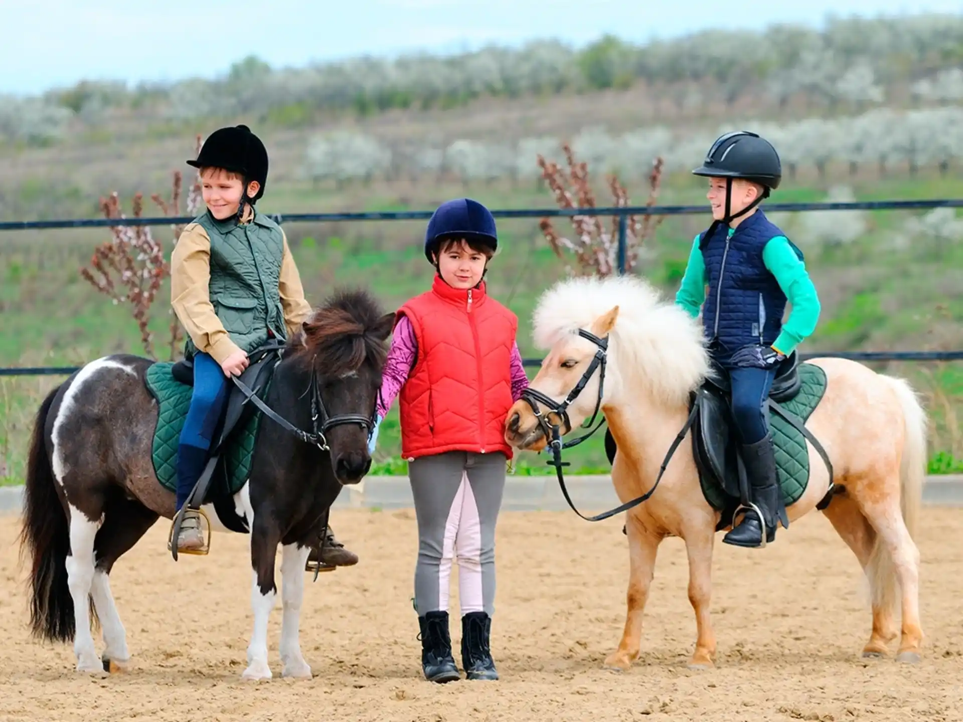 a group of people riding horses