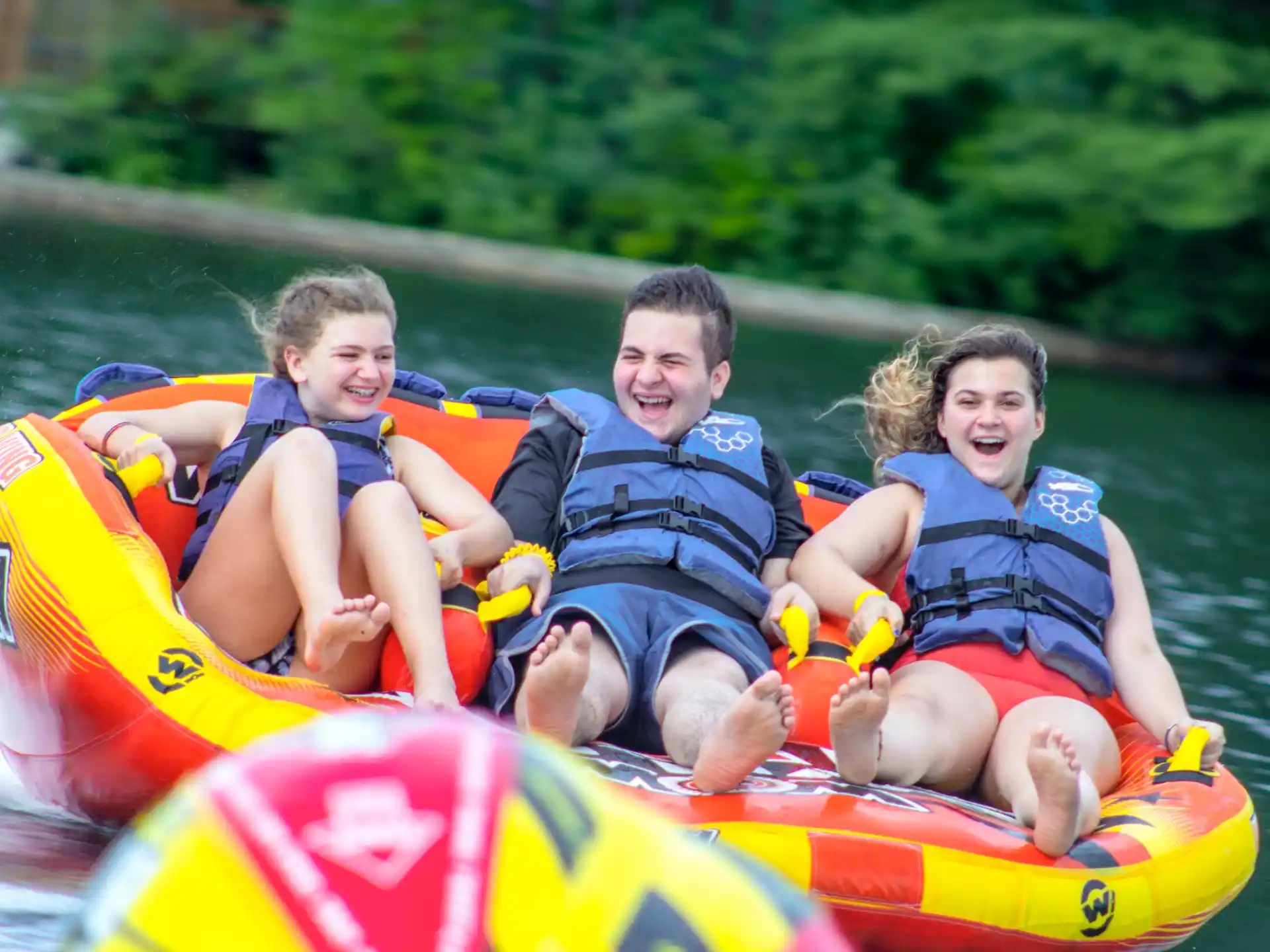 a group of people in a raft