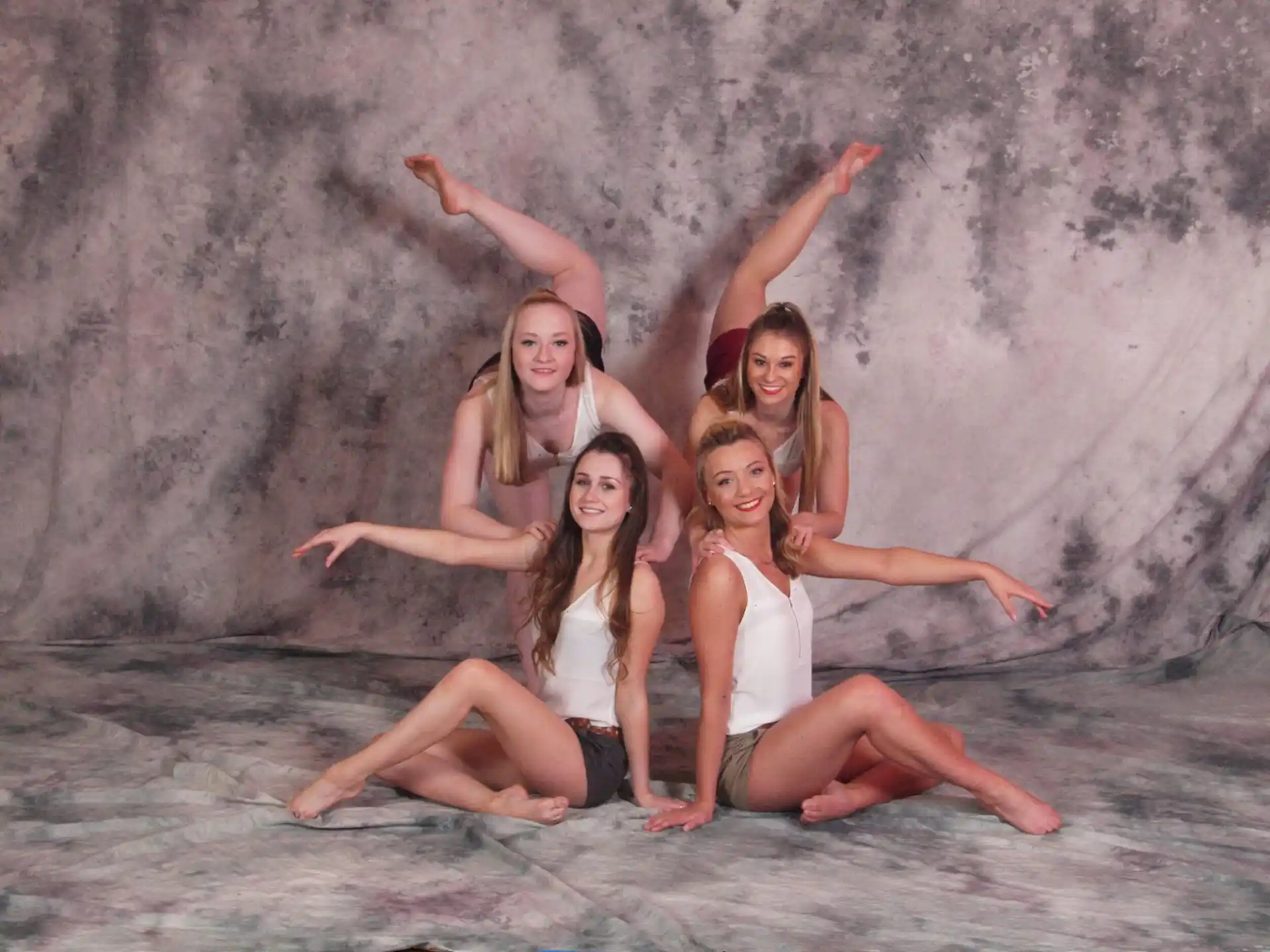 a group of women posing for a photo