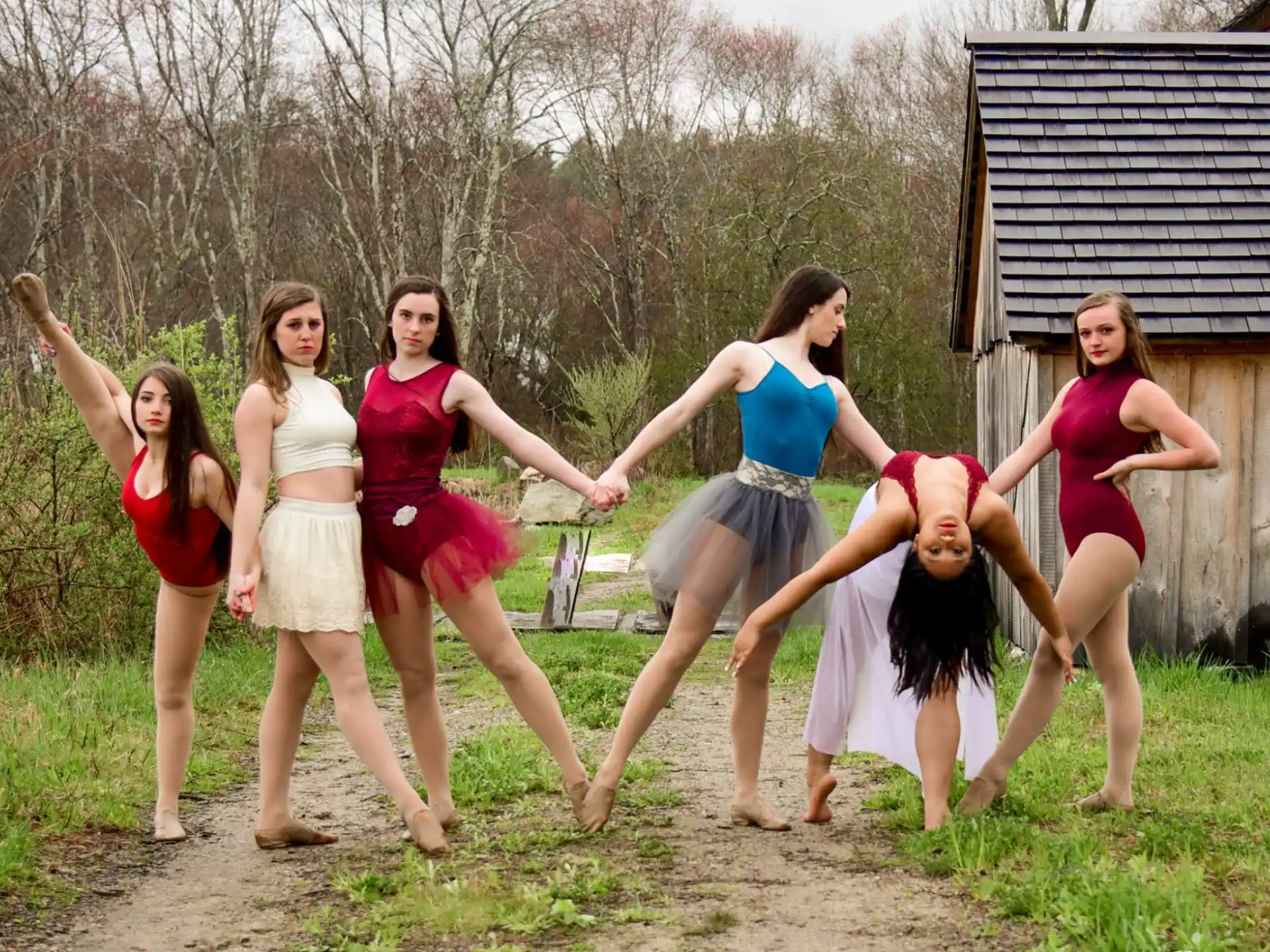 a group of women dancing outside