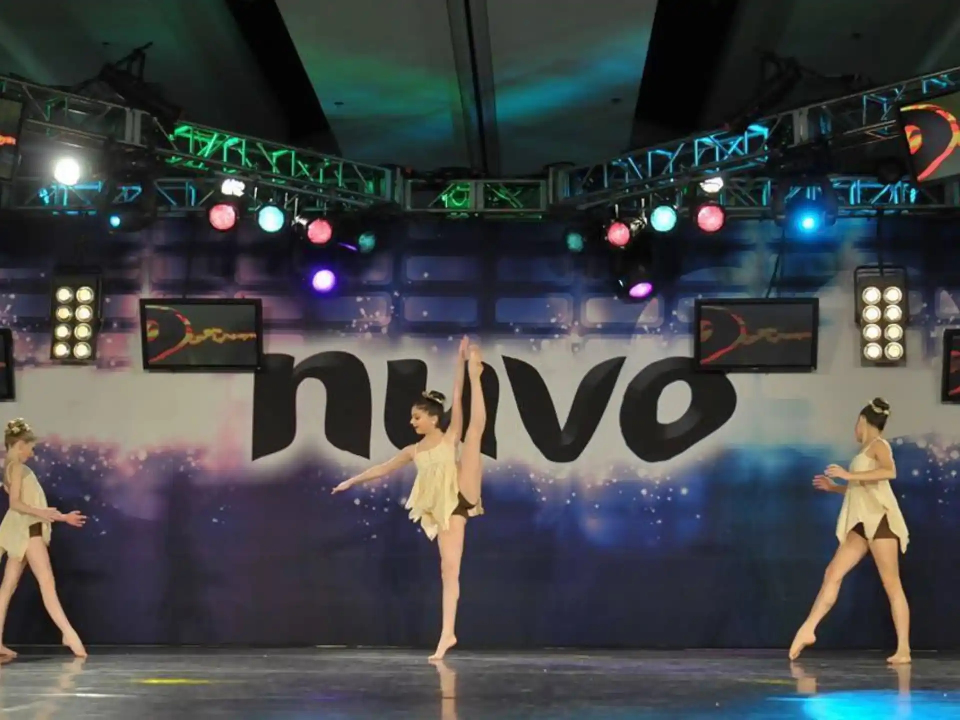 a group of women dancing on a stage