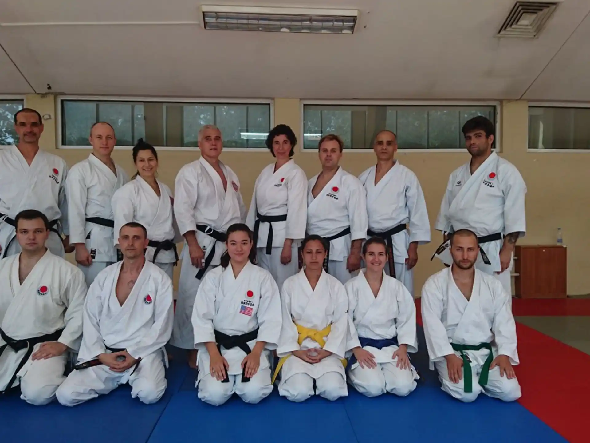 a group of people in white uniforms